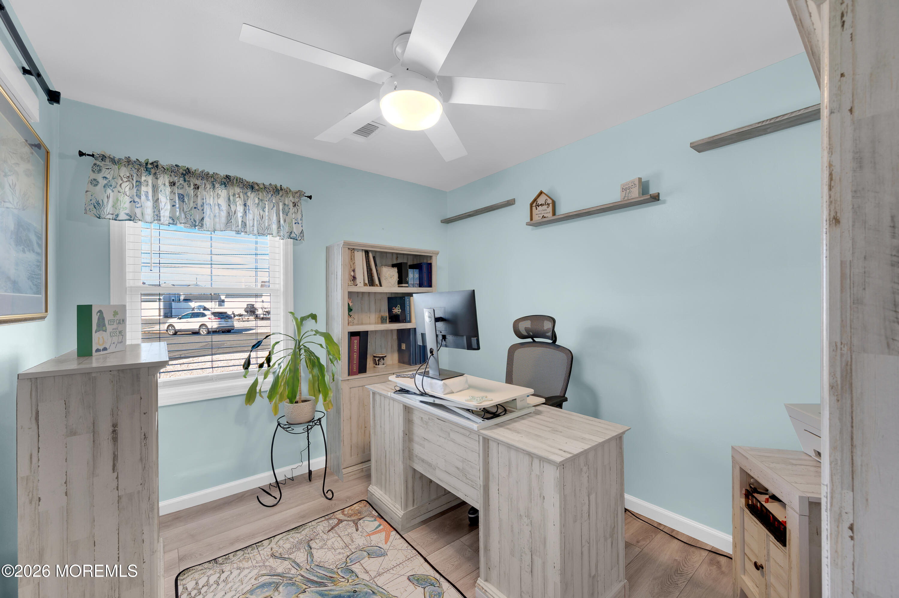 204 Biscayne Road Barnegat, NJ 08005 - Photo 19 of 43 a room with furniture and a fireplace