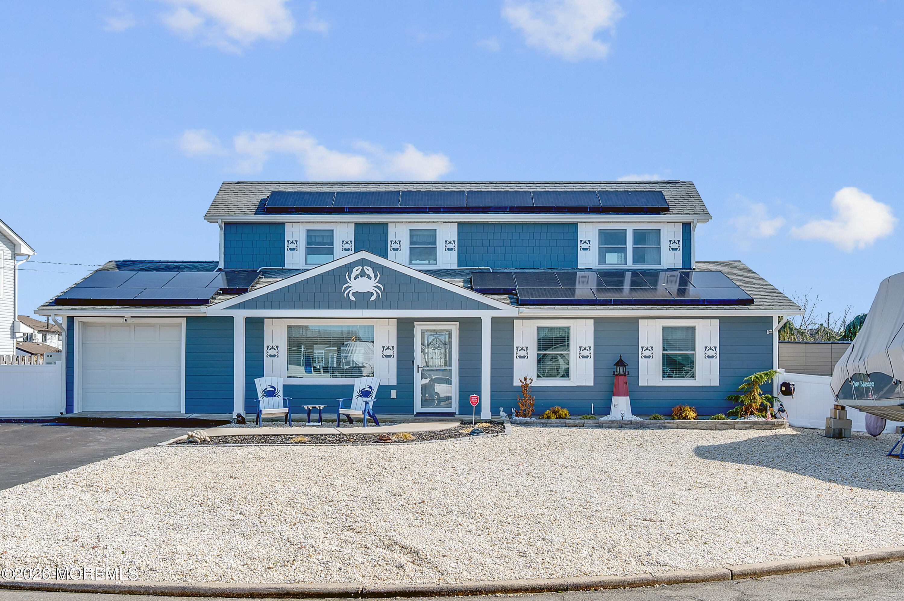 204 Biscayne Road Barnegat, NJ 08005 - Photo 4 of 43 front view of a house with a porch