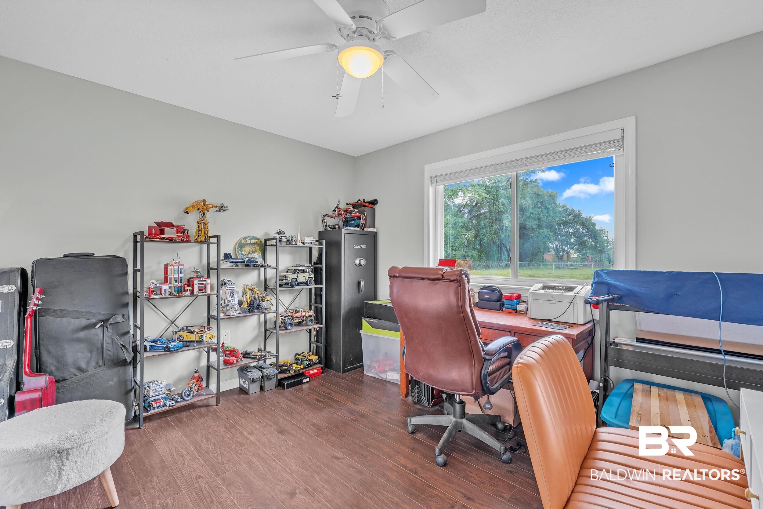 206 West Jackson Avenue Summerdale, AL 36580 - Photo 24 of 37 Office space featuring wood finished floors and a ceiling fan