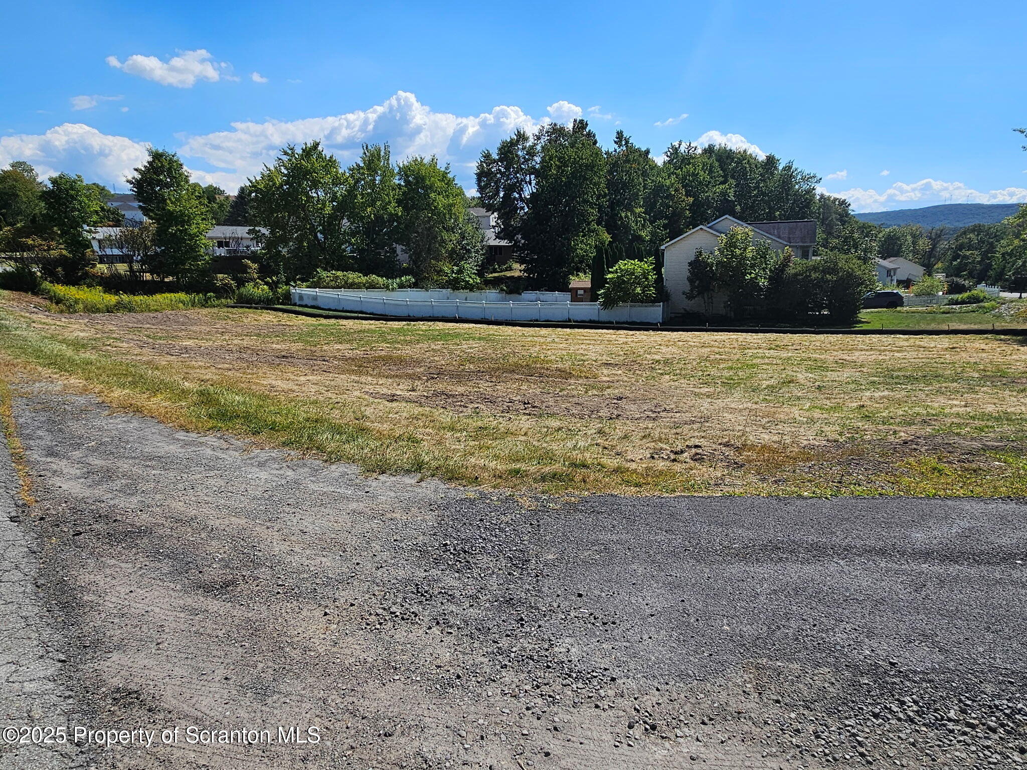 Willowbrook Road Clarks Summit, PA 18411 - Photo 5 of 7 a view of a swimming pool and trees in the background