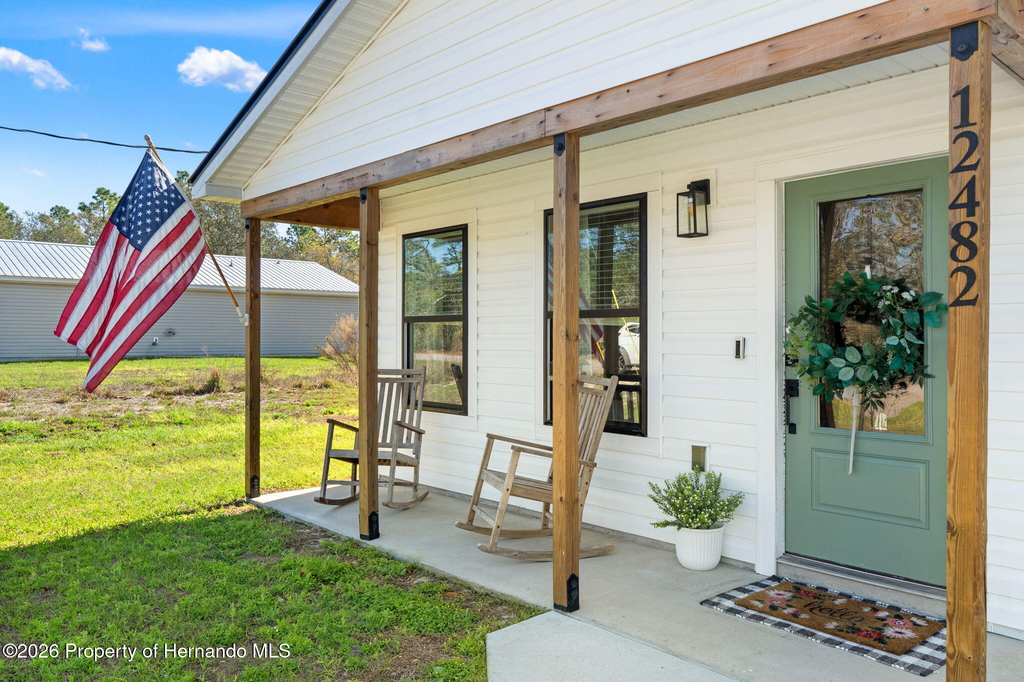 12482 Mountain Plover Road Weeki Wachee, FL 34614 - Photo 2 of 22 Front porch