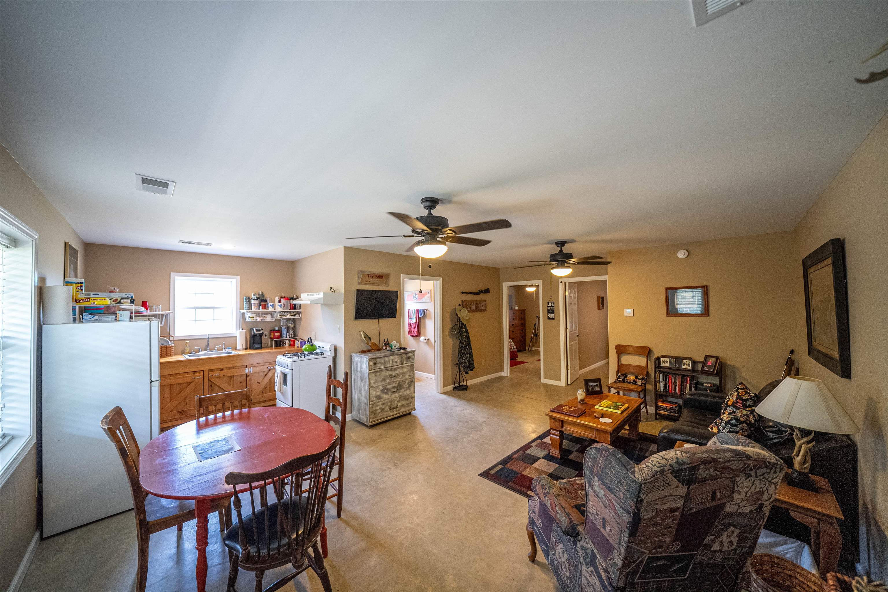 1485 Walton Road Bolivar, TN 38008 - Photo 13 of 23 Dining space featuring concrete floors
