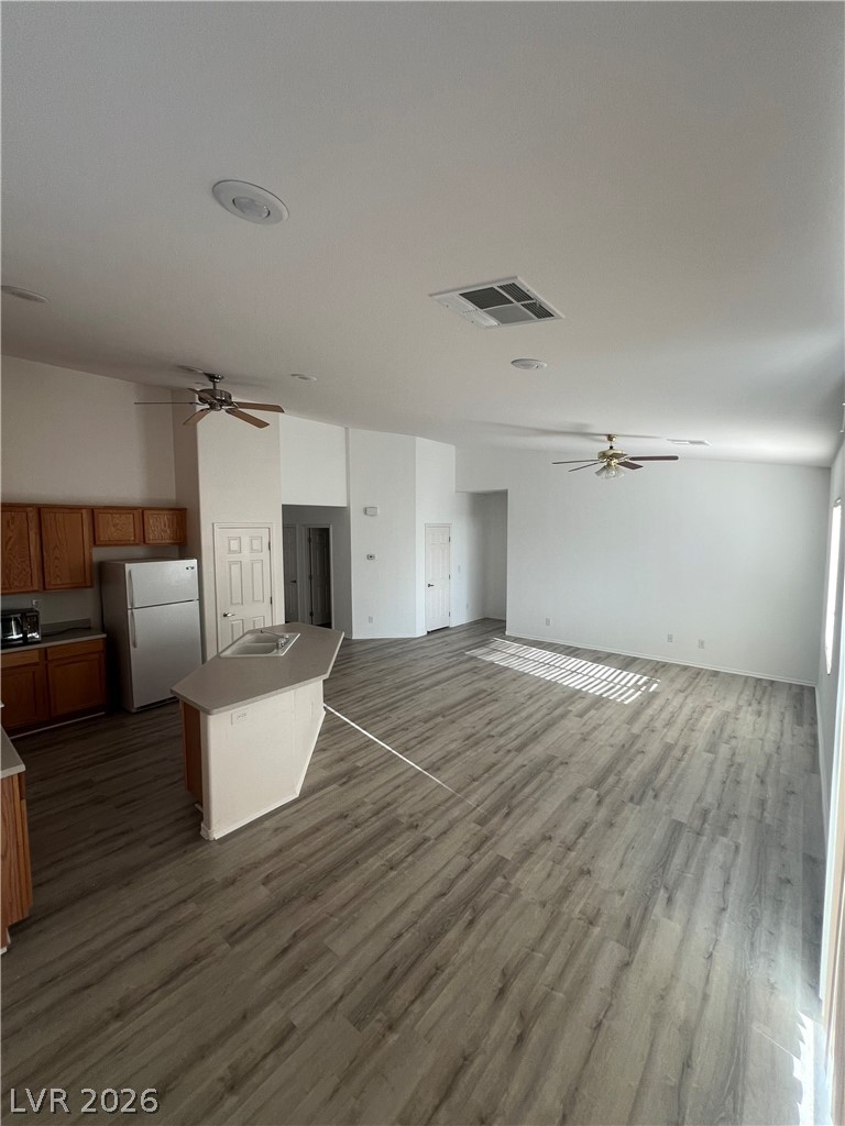 6472 Centennial Road Pahrump, NV 89048 - Photo 29 of 33 An open concept living area featuring contemporary flooring and convenient kitchen island.