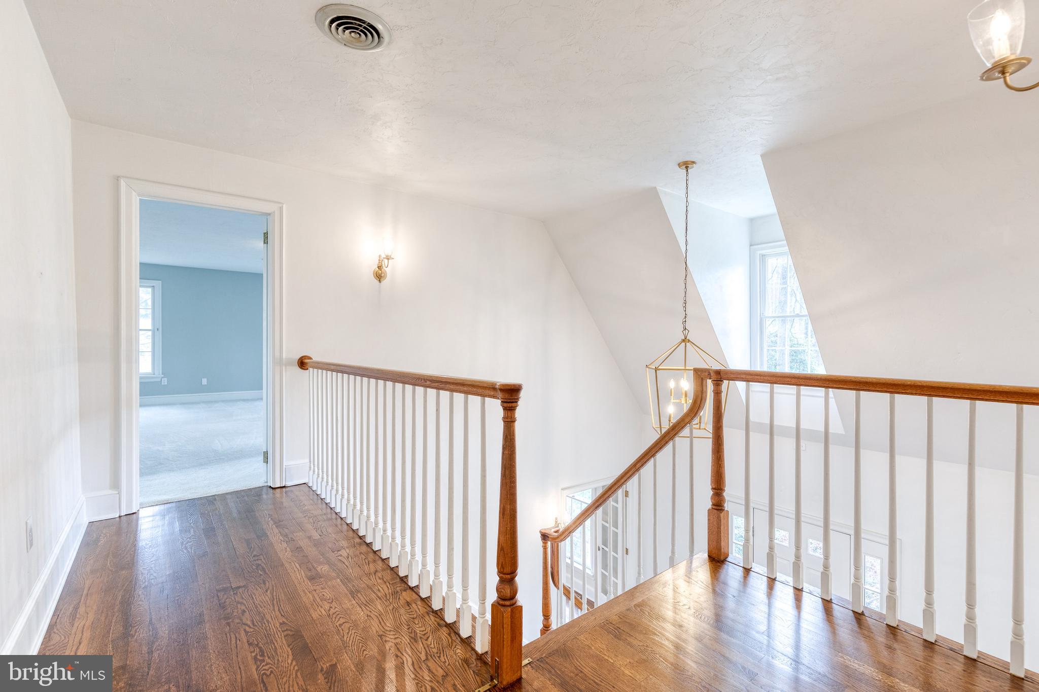 1216 Bonaire Road Forest Hill, MD 21050 - Photo 42 of 71 a view of a hallway with wooden floor and entryway
