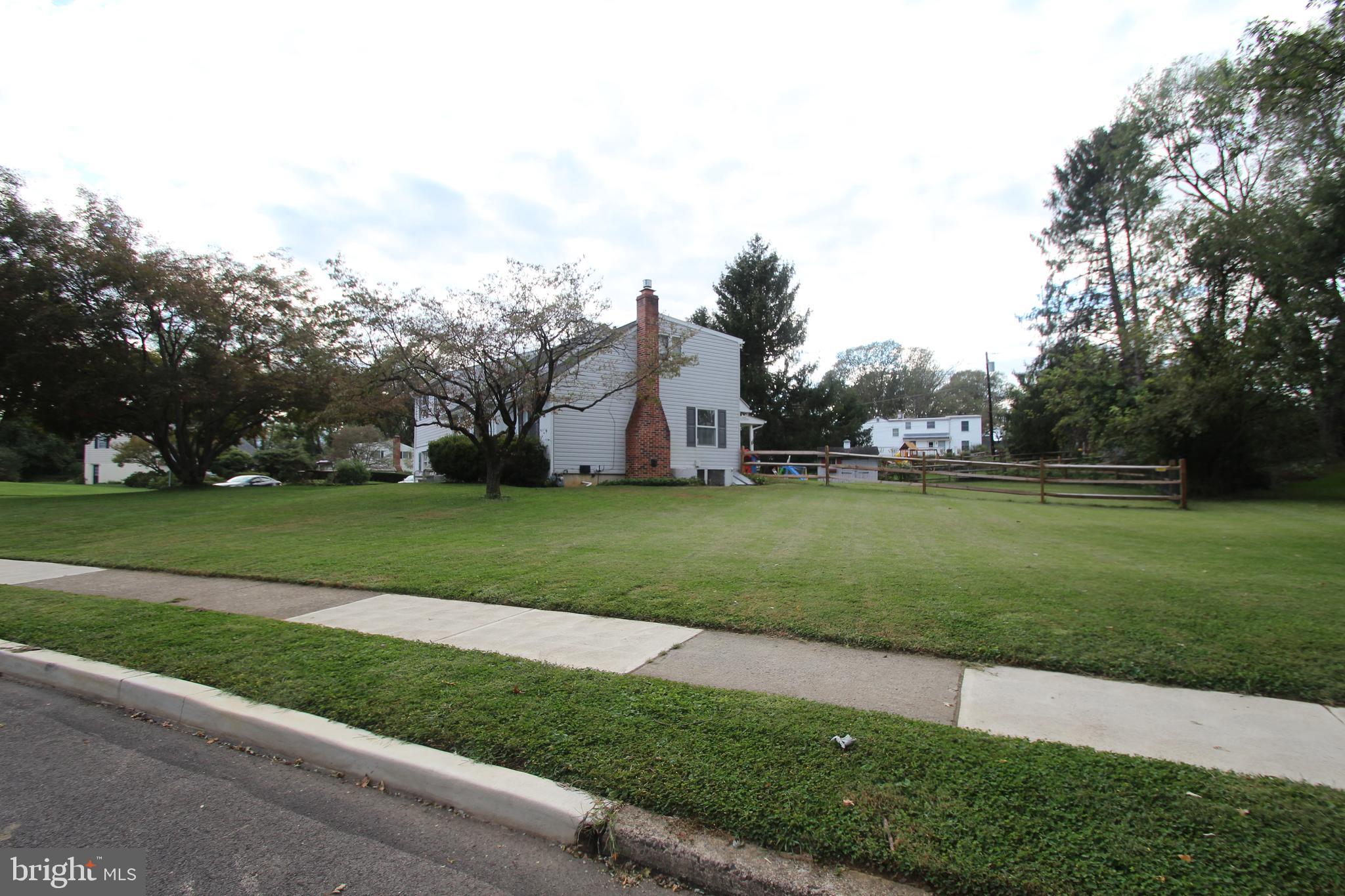 201 Spruce Road Flourtown, PA 19031 - Photo 3 of 39 a view of building with green space