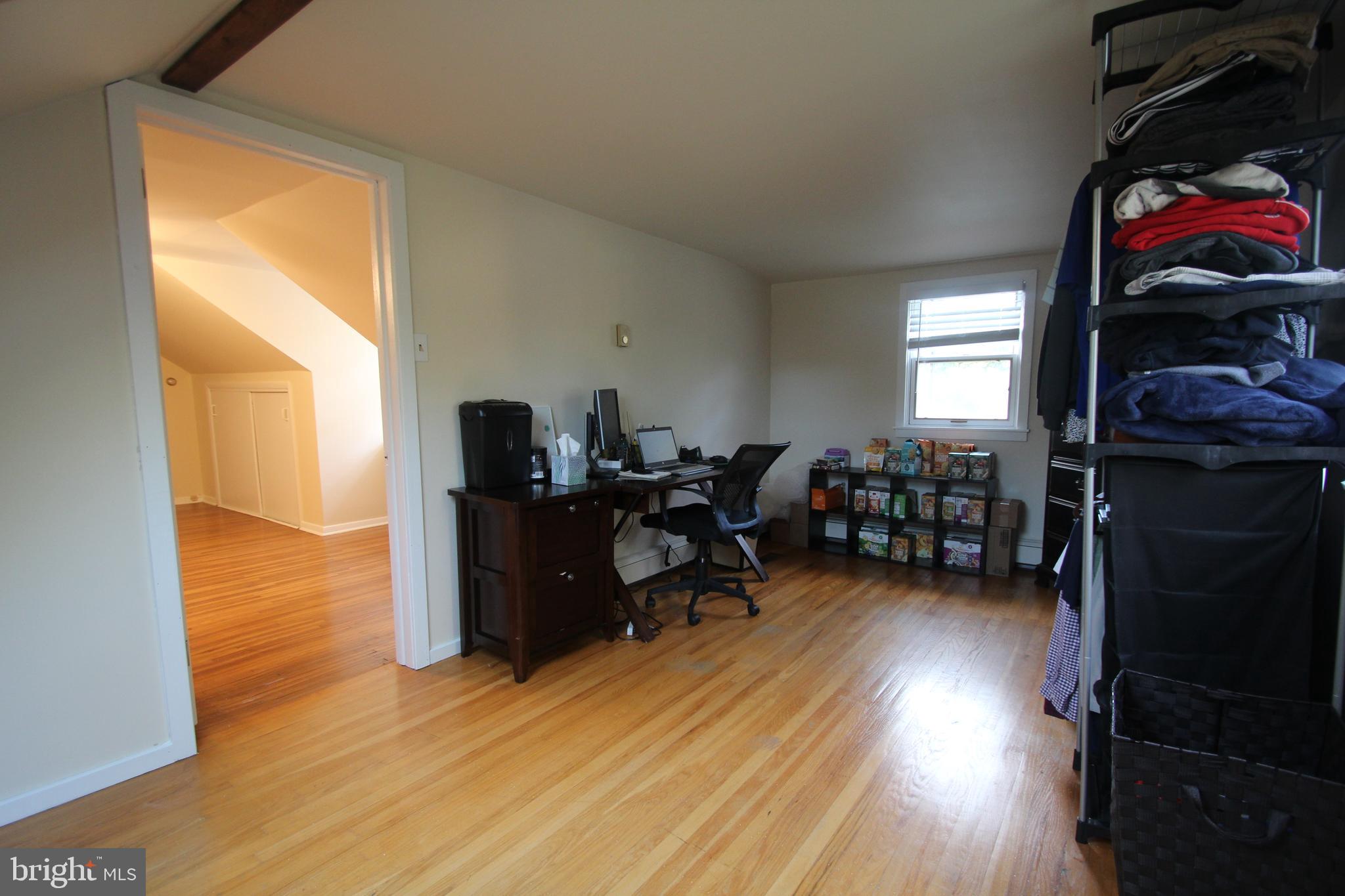 201 Spruce Road Flourtown, PA 19031 - Photo 22 of 39 a living room with furniture and a wooden floor