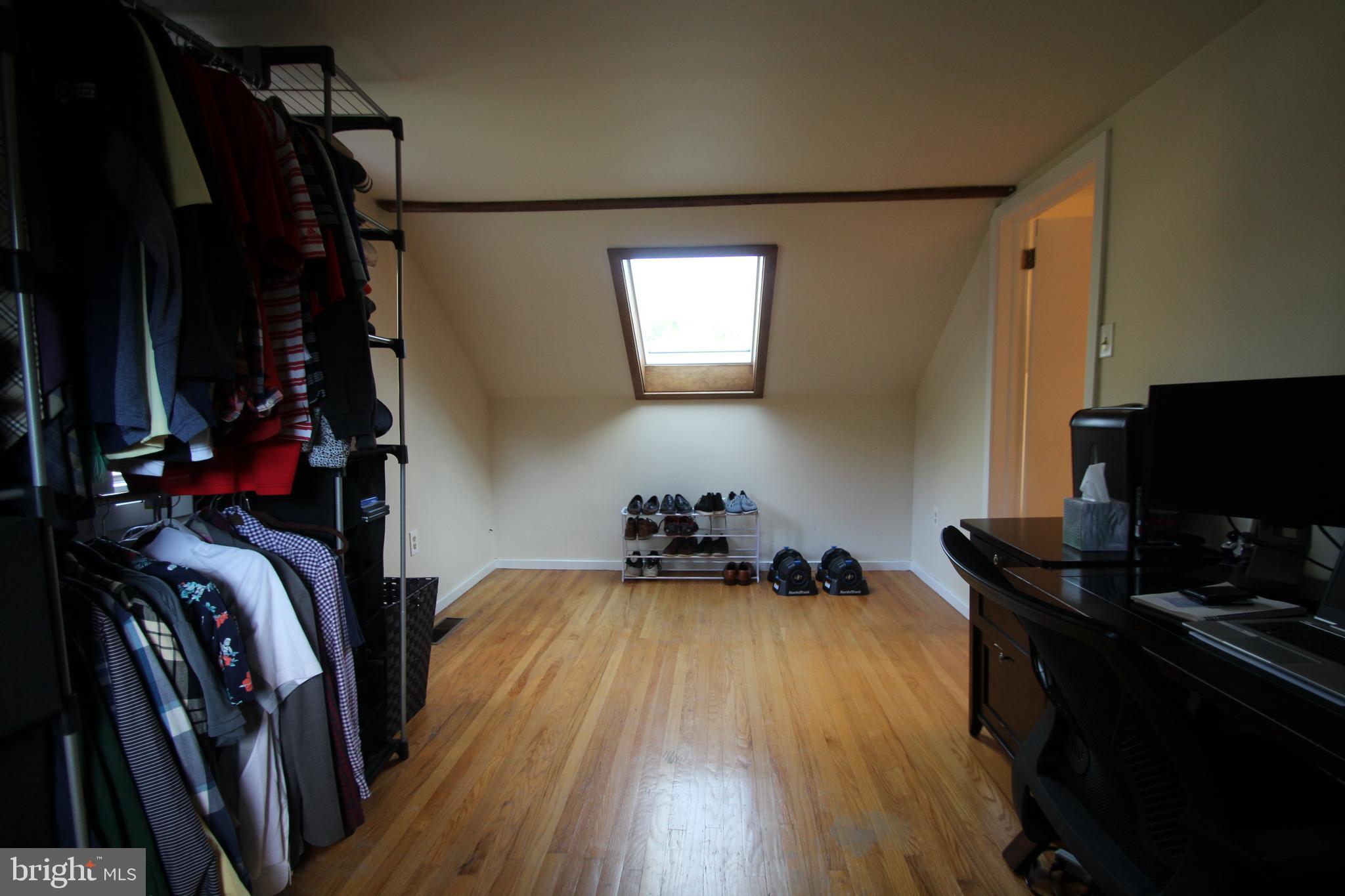 201 Spruce Road Flourtown, PA 19031 - Photo 23 of 39 a view of a hallway with workspace and a window