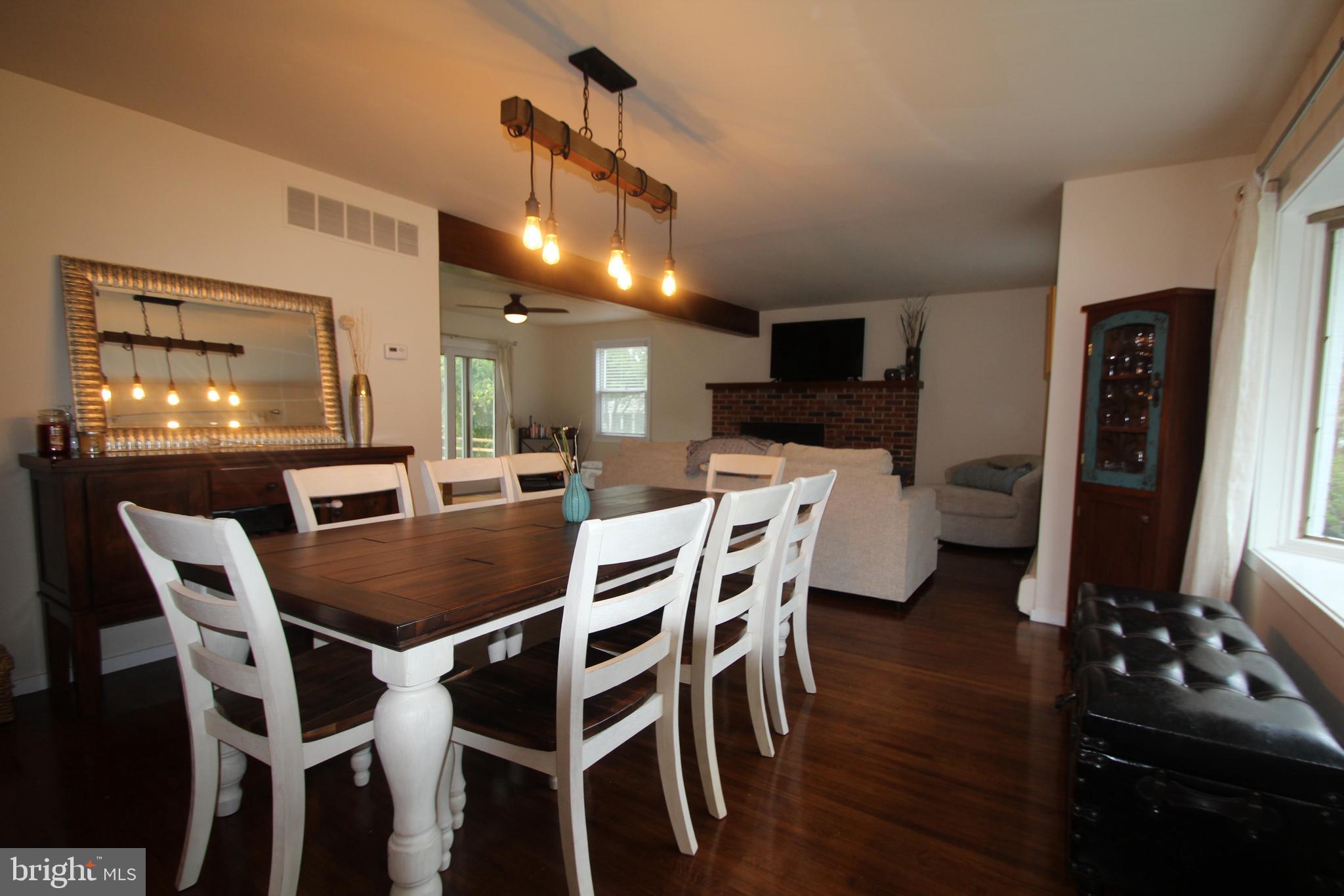 201 Spruce Road Flourtown, PA 19031 - Photo 4 of 39 a kitchen with a table and chairs in it