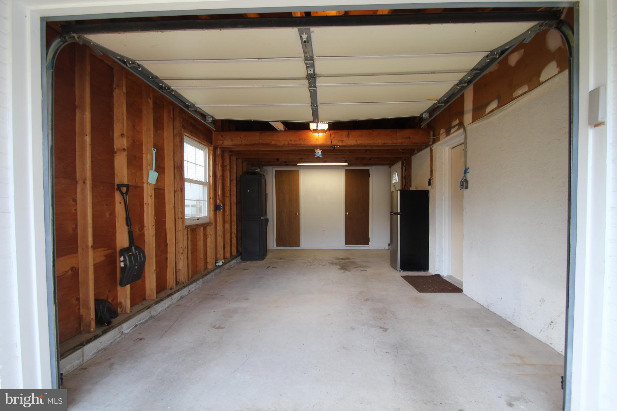 201 Spruce Road Flourtown, PA 19031 - Photo 36 of 39 a view of a hallway with a chandelier