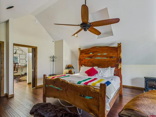 a bedroom with furniture and a bed