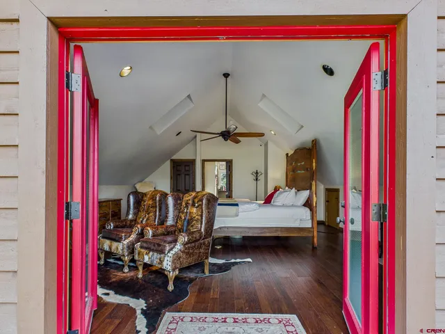 a view of balcony with wooden floor and fence