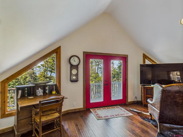 a bedroom with furniture and a bed