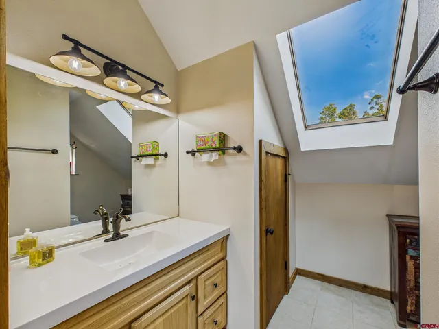 a room with toys and dresser