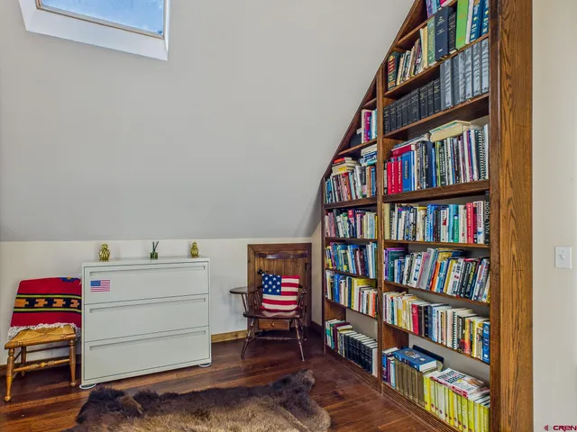 a front view of a residential apartment building with a yard