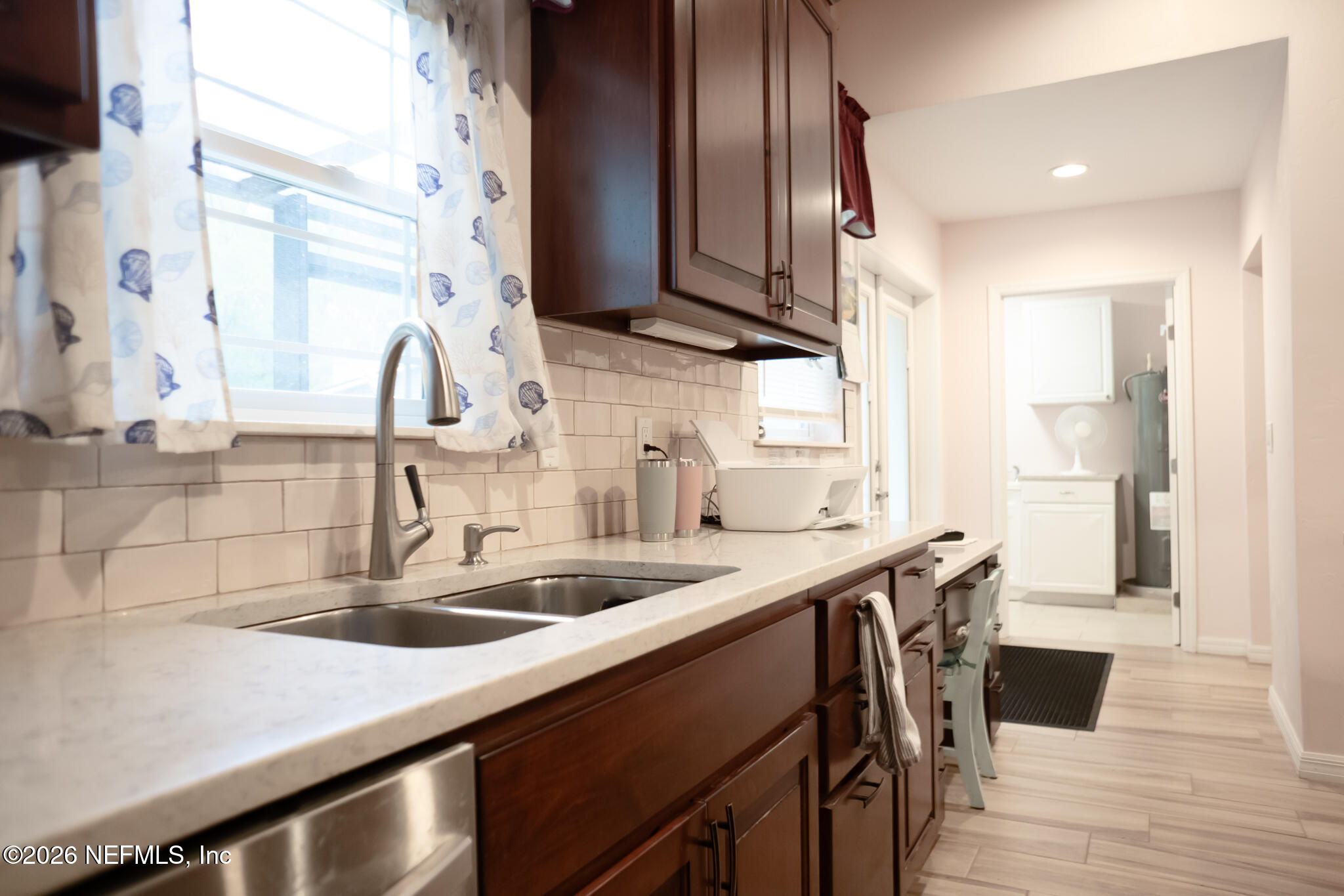 161 Southwest Jasmine Avenue Keystone Heights, FL 32656 - Photo 14 of 47 a kitchen with stainless steel appliances a sink and a stove