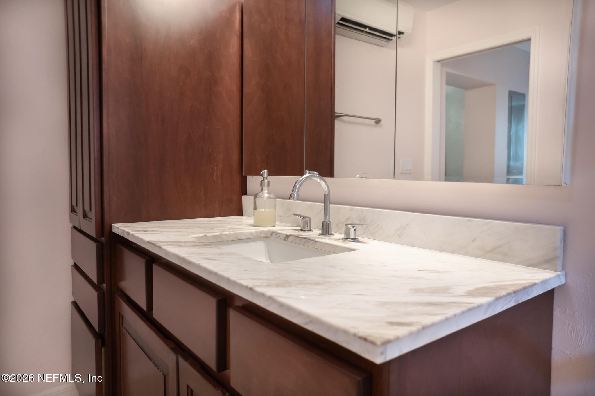 161 Southwest Jasmine Avenue Keystone Heights, FL 32656 - Photo 18 of 47 a bathroom with a granite countertop sink and a mirror