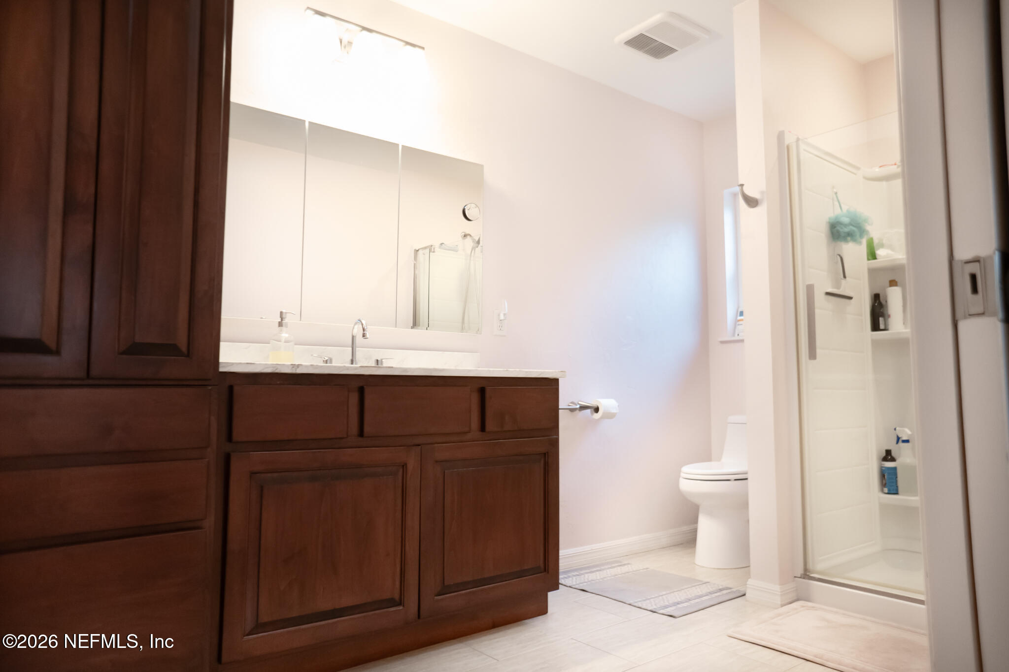 161 Southwest Jasmine Avenue Keystone Heights, FL 32656 - Photo 21 of 47 a bathroom with a sink a toilet and shower