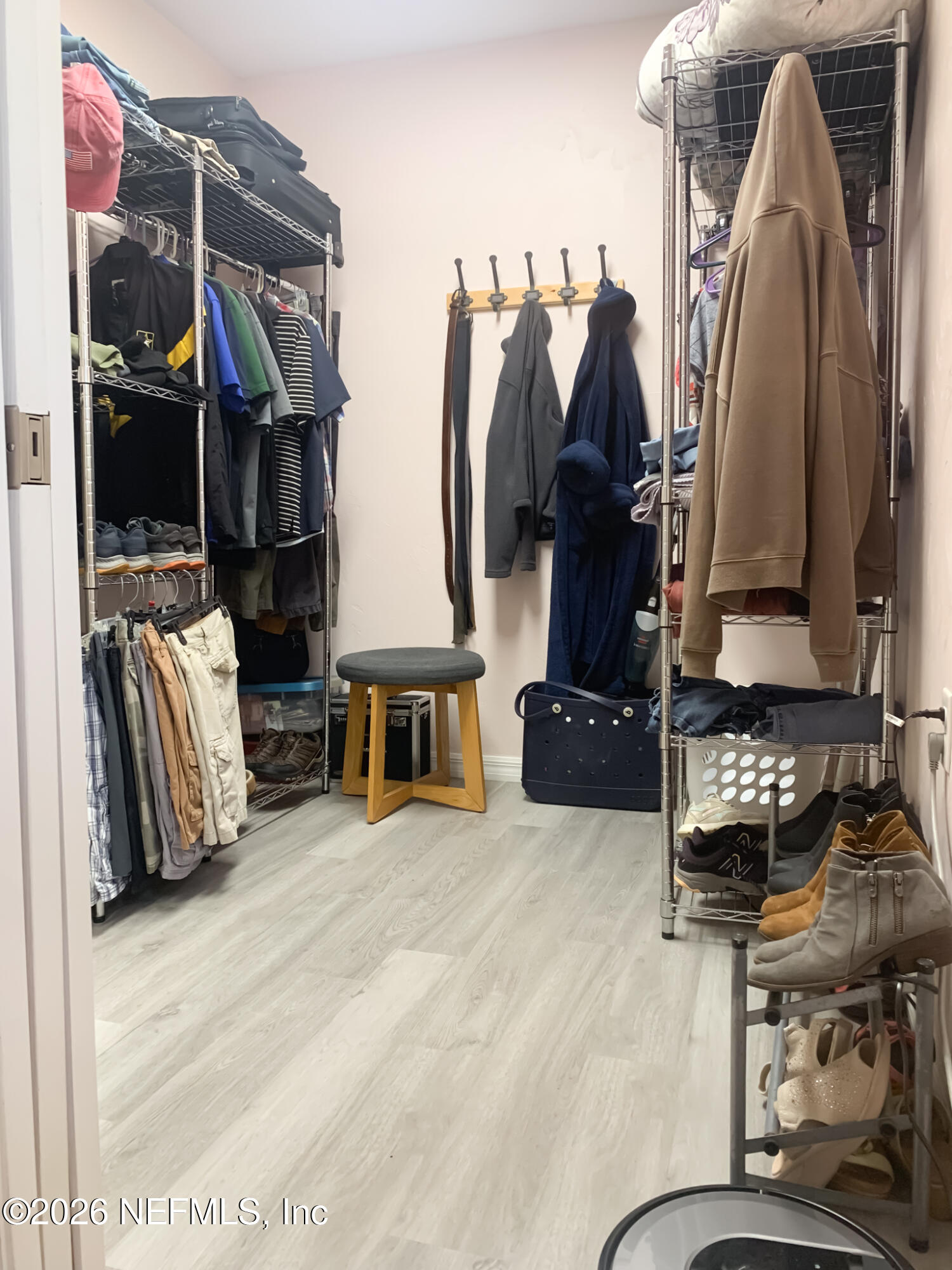 161 Southwest Jasmine Avenue Keystone Heights, FL 32656 - Photo 22 of 47 a view of walk in closet with clothes and shoes