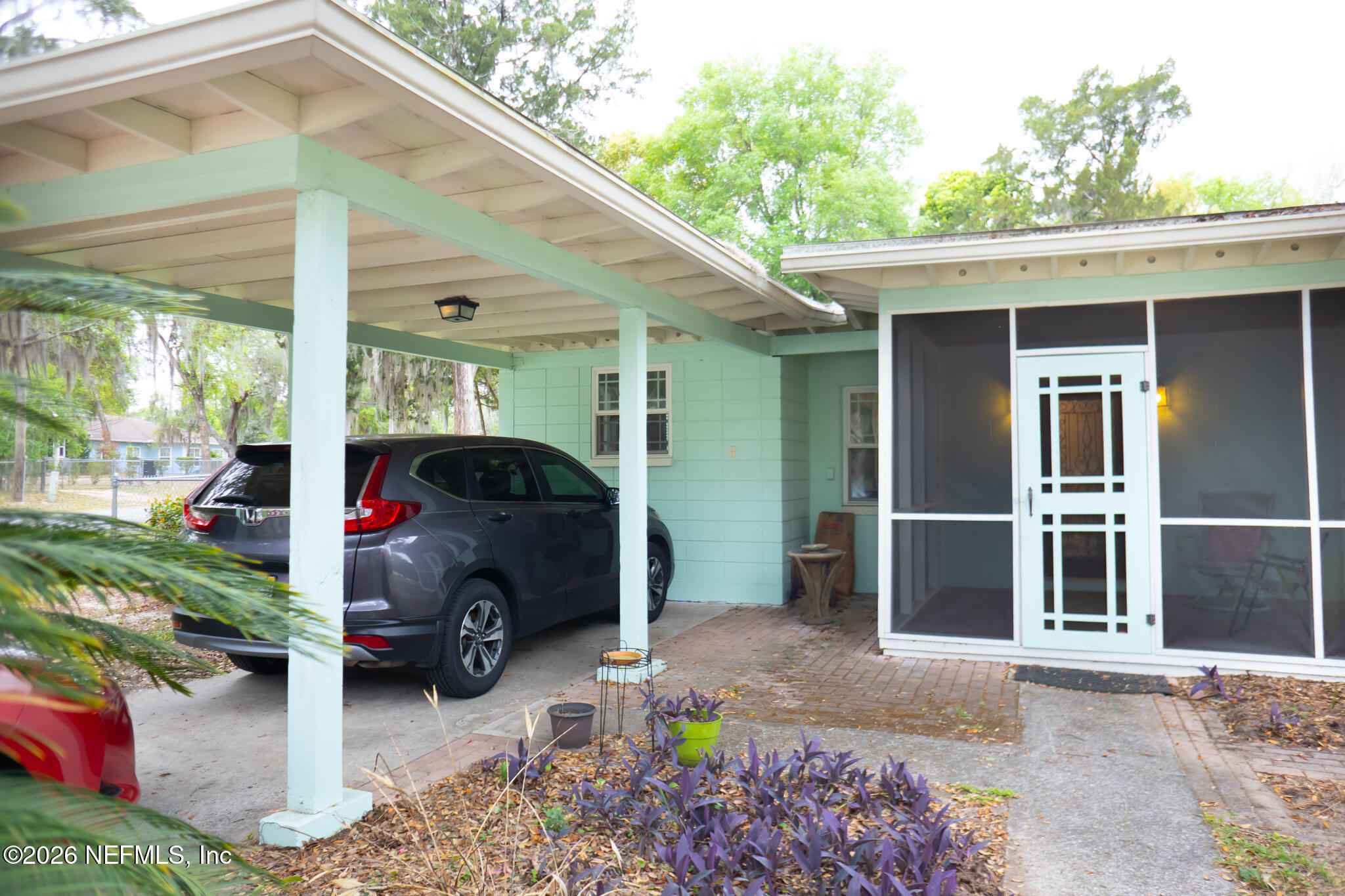 161 Southwest Jasmine Avenue Keystone Heights, FL 32656 - Photo 3 of 47 a car parked in front of house