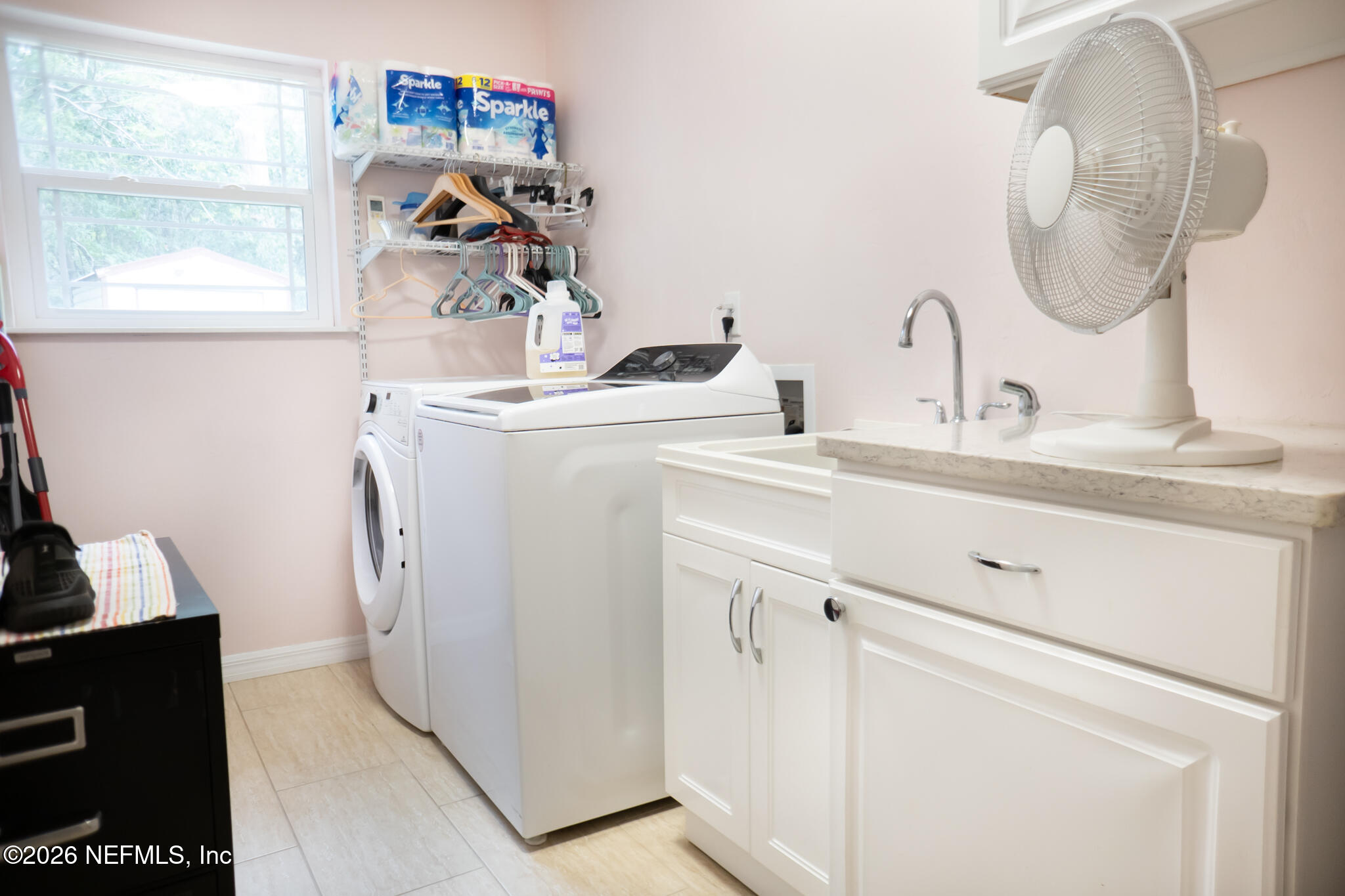 161 Southwest Jasmine Avenue Keystone Heights, FL 32656 - Photo 34 of 47 a bathroom with a sink and a mirror