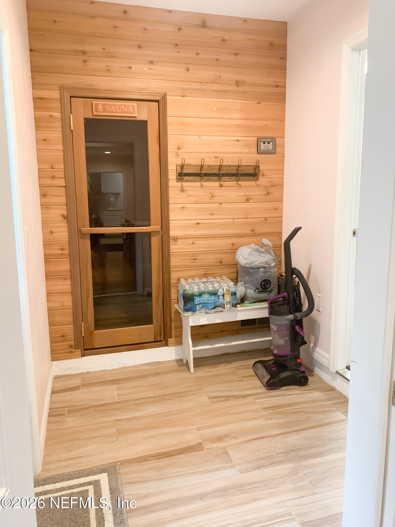 161 Southwest Jasmine Avenue Keystone Heights, FL 32656 - Photo 35 of 47 a view of a room with wooden floor and windows