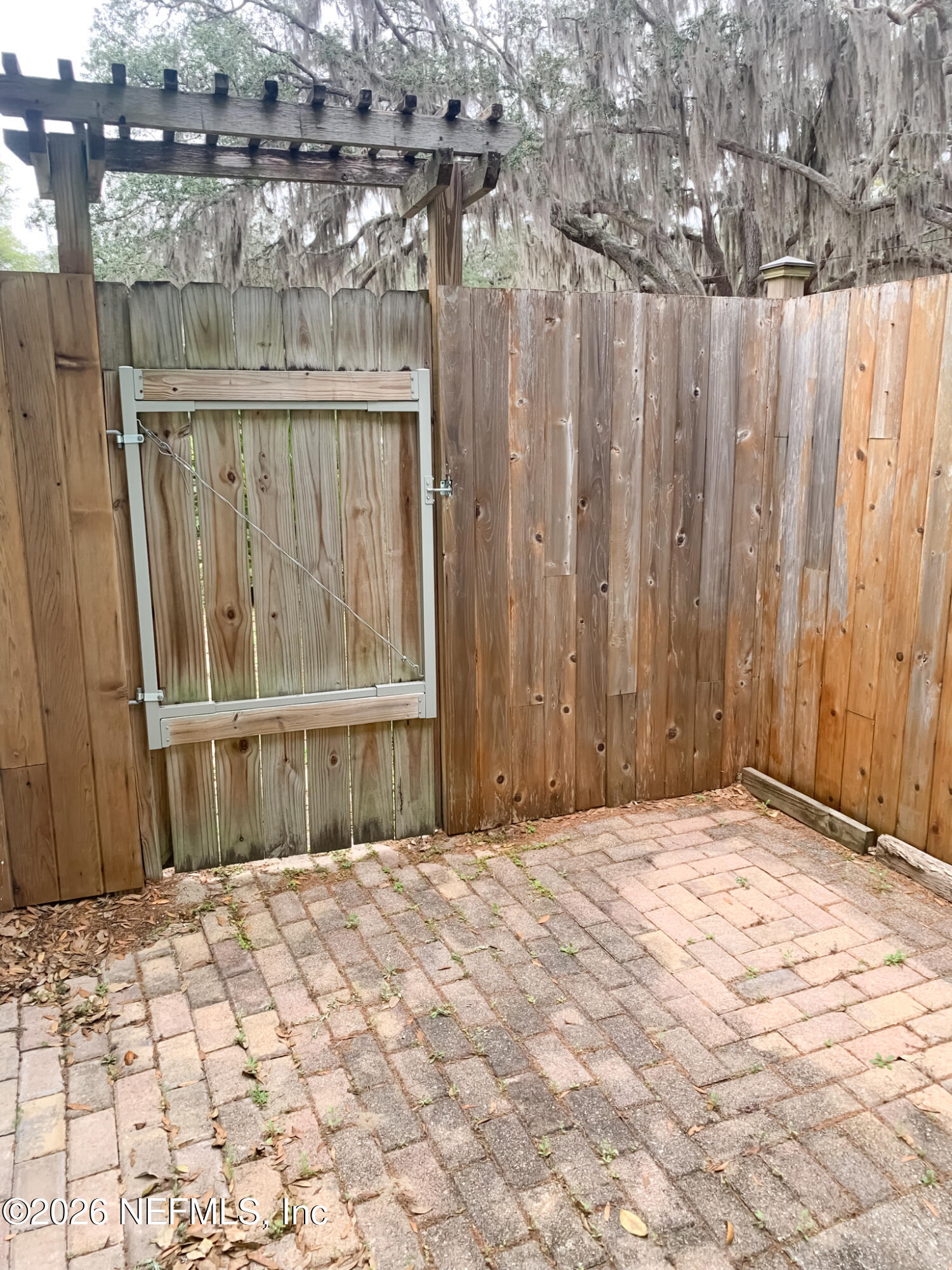 161 Southwest Jasmine Avenue Keystone Heights, FL 32656 - Photo 38 of 47 a front view of a house with a wooden fence