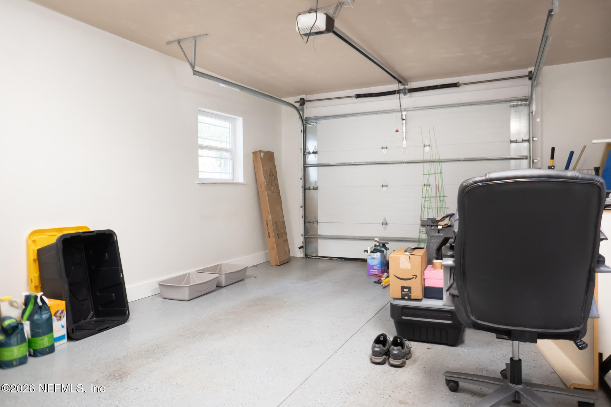 161 Southwest Jasmine Avenue Keystone Heights, FL 32656 - Photo 40 of 47 a view of a workspace with furniture and gym equipment