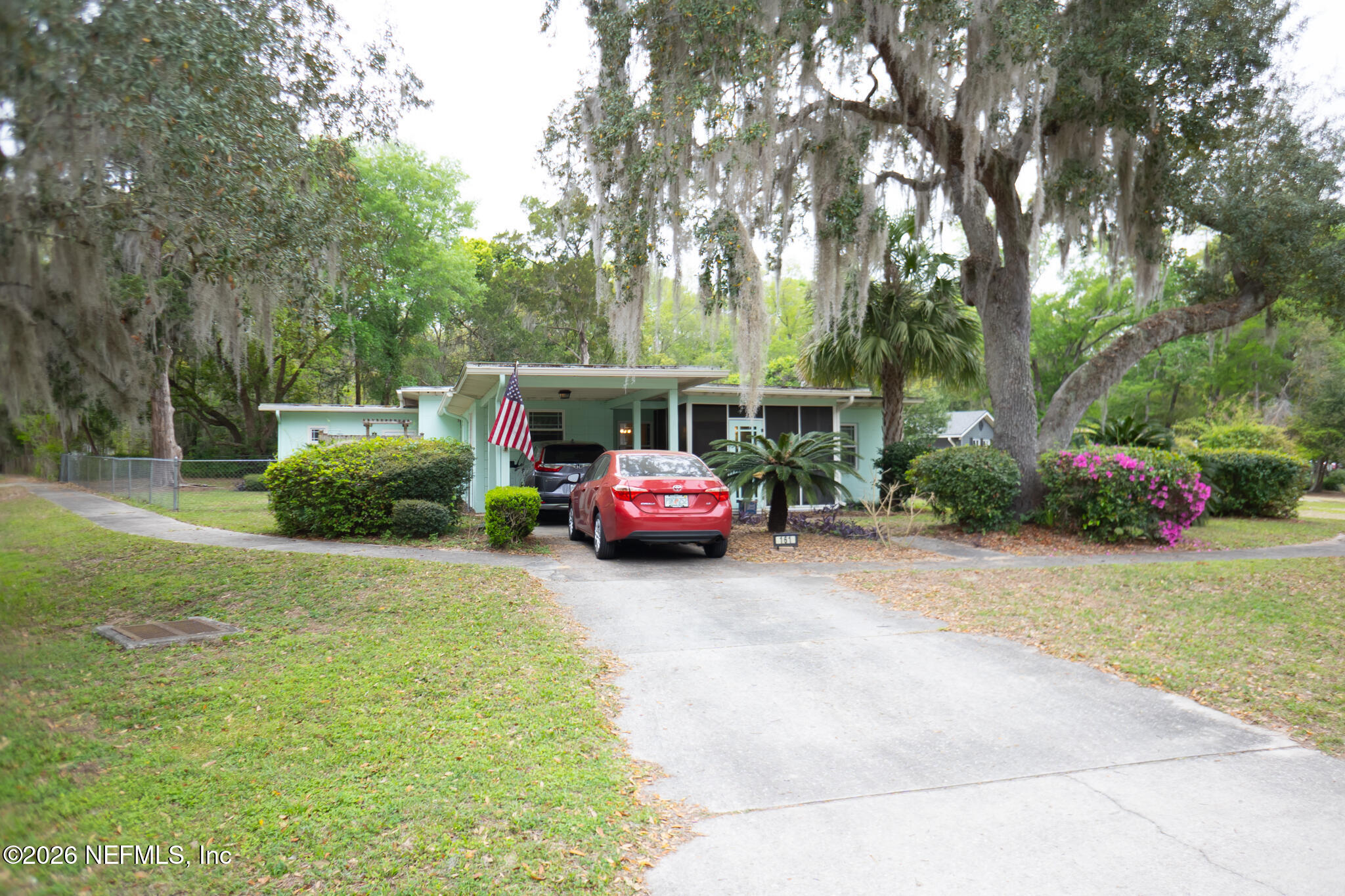 161 Southwest Jasmine Avenue Keystone Heights, FL 32656 - Photo 4 of 47 a view of a car parked in front of a house