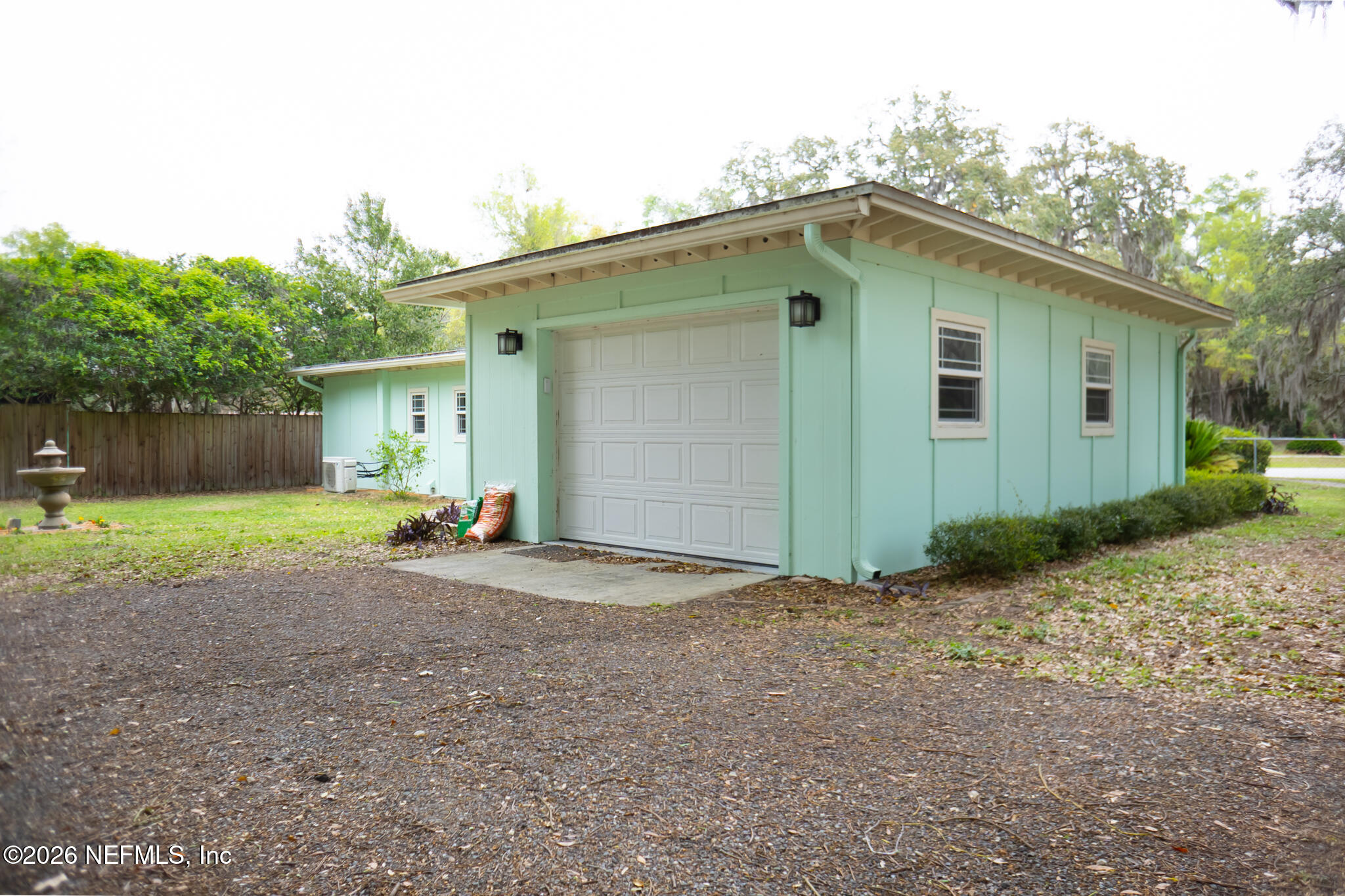 161 Southwest Jasmine Avenue Keystone Heights, FL 32656 - Photo 41 of 47 a view of a house with a yard and garage