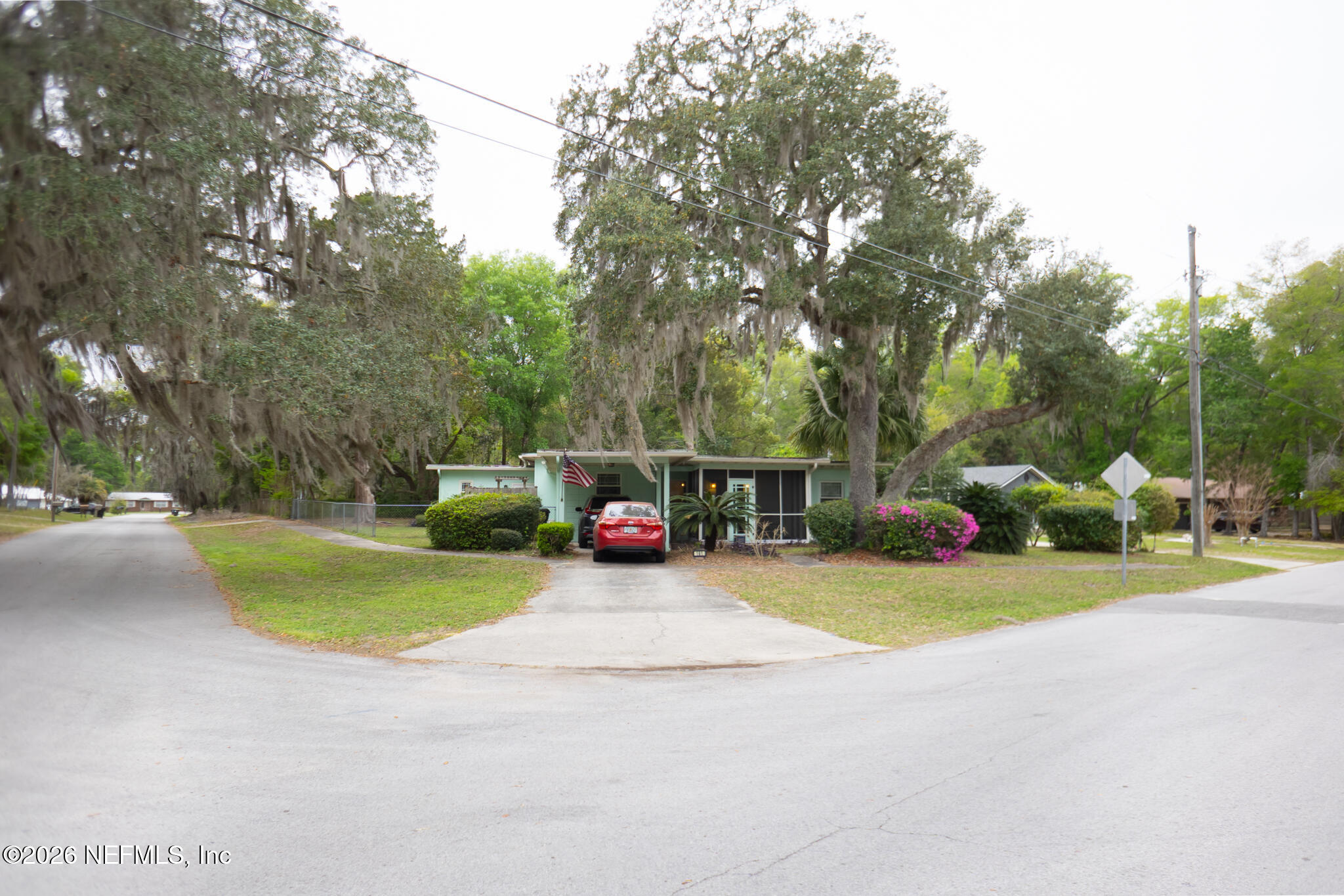 161 Southwest Jasmine Avenue Keystone Heights, FL 32656 - Photo 5 of 47 a view of a house with backyard and sitting area