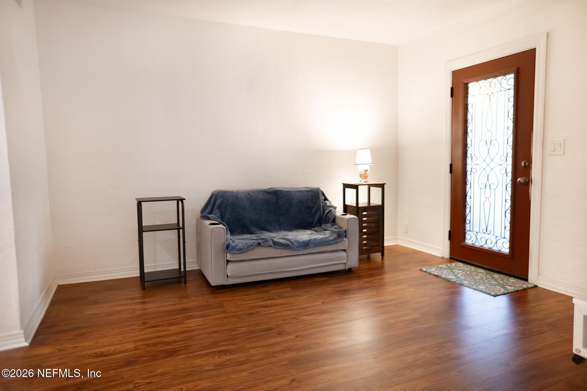 161 Southwest Jasmine Avenue Keystone Heights, FL 32656 - Photo 6 of 47 a living room with furniture and a wooden floor