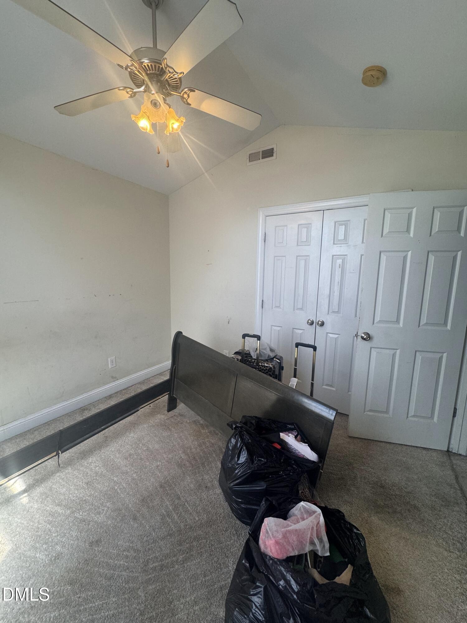 4109 Huntsmoor Lane Wilson, NC 27896 - Photo 15 of 26 a room with furniture and chandelier