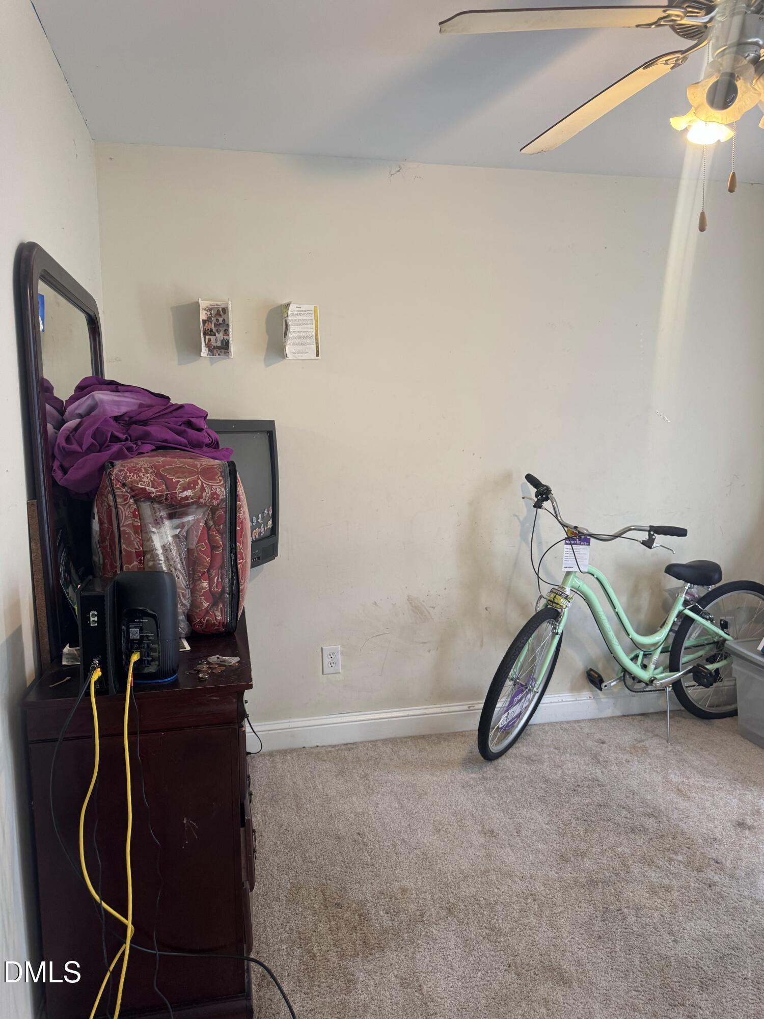 4109 Huntsmoor Lane Wilson, NC 27896 - Photo 16 of 26 a view of a room with gym equipment
