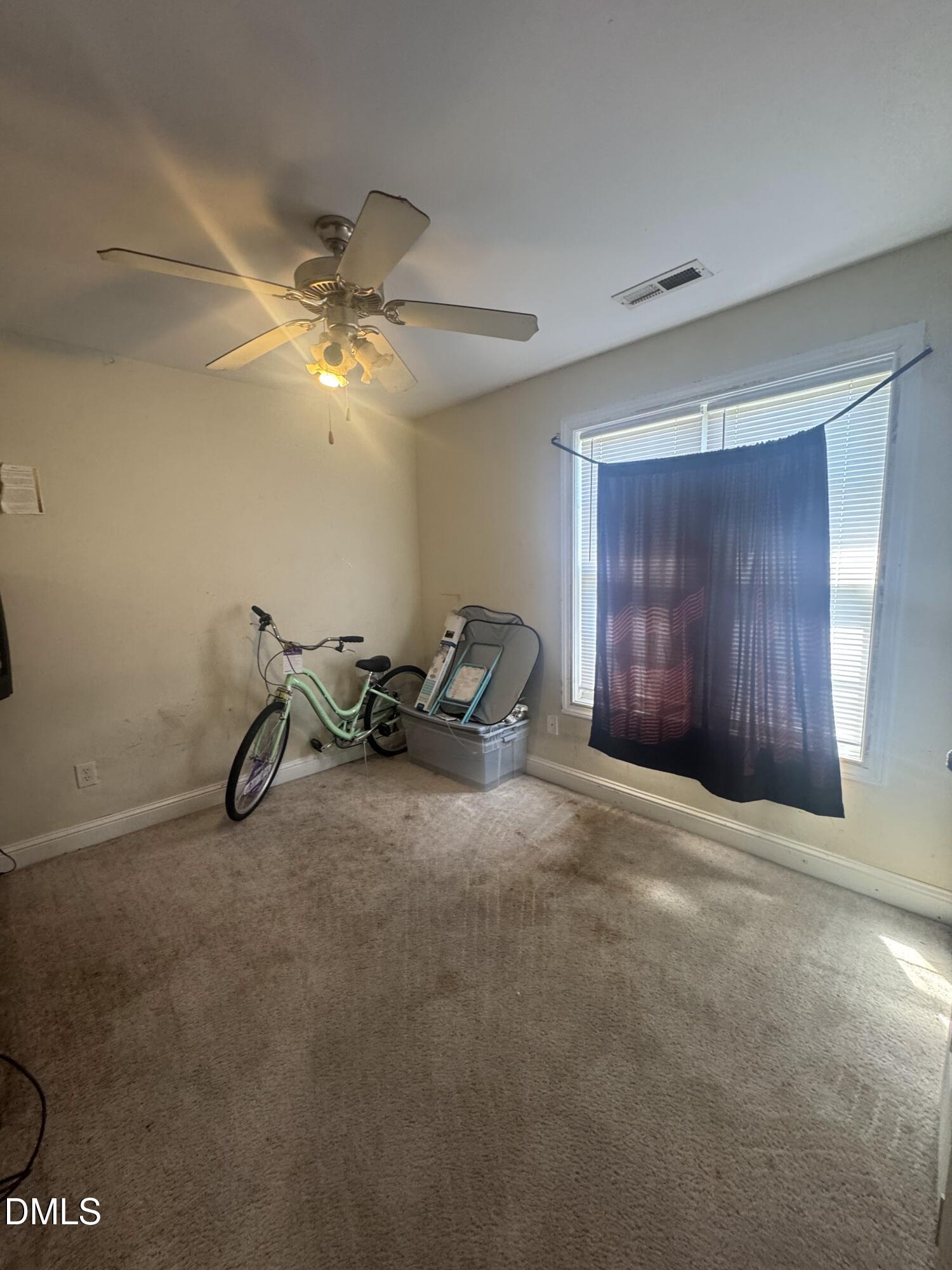 4109 Huntsmoor Lane Wilson, NC 27896 - Photo 18 of 26 a view of a room with gym equipment