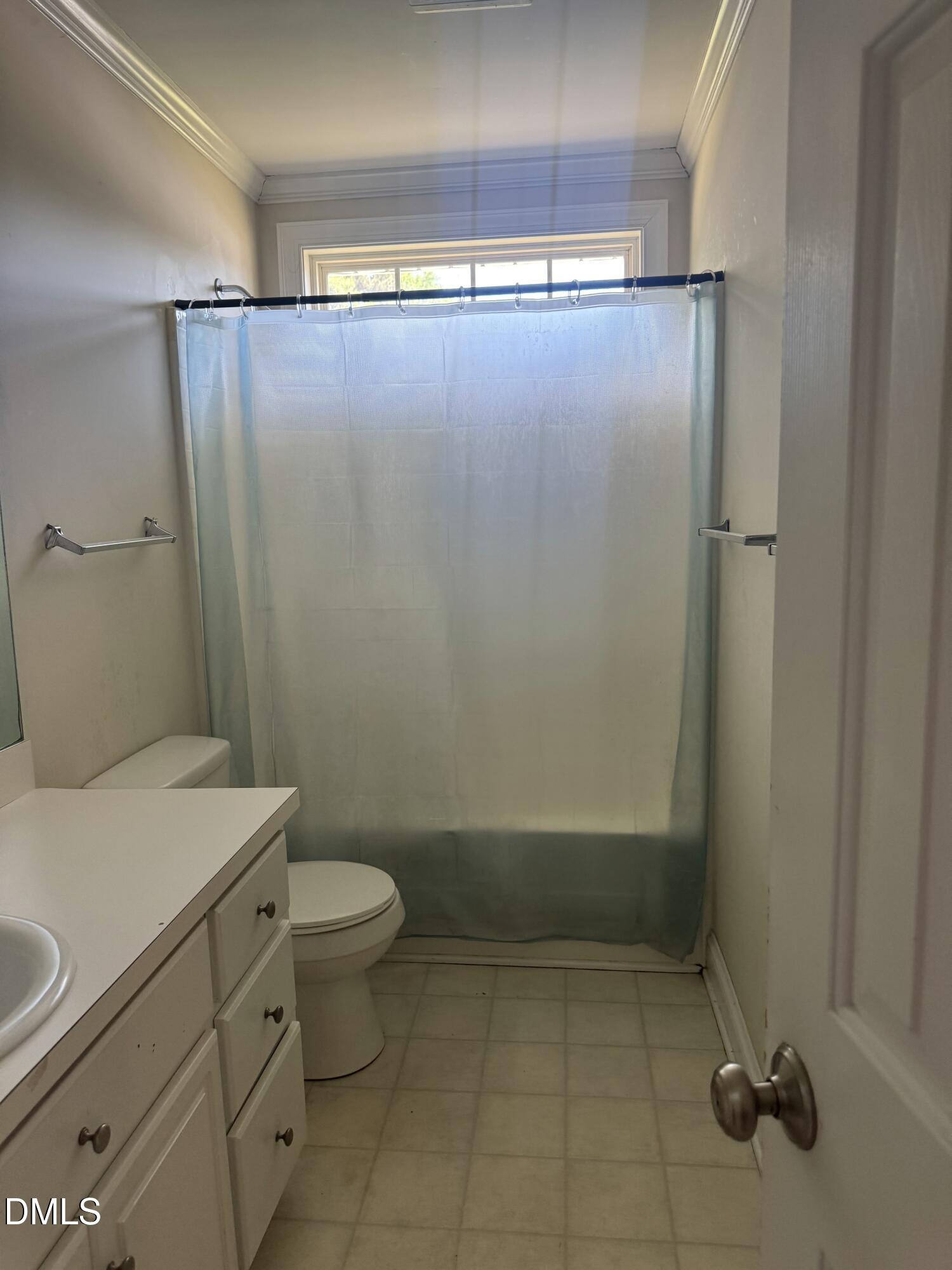 4109 Huntsmoor Lane Wilson, NC 27896 - Photo 20 of 26 a bathroom with a sink a toilet and shower