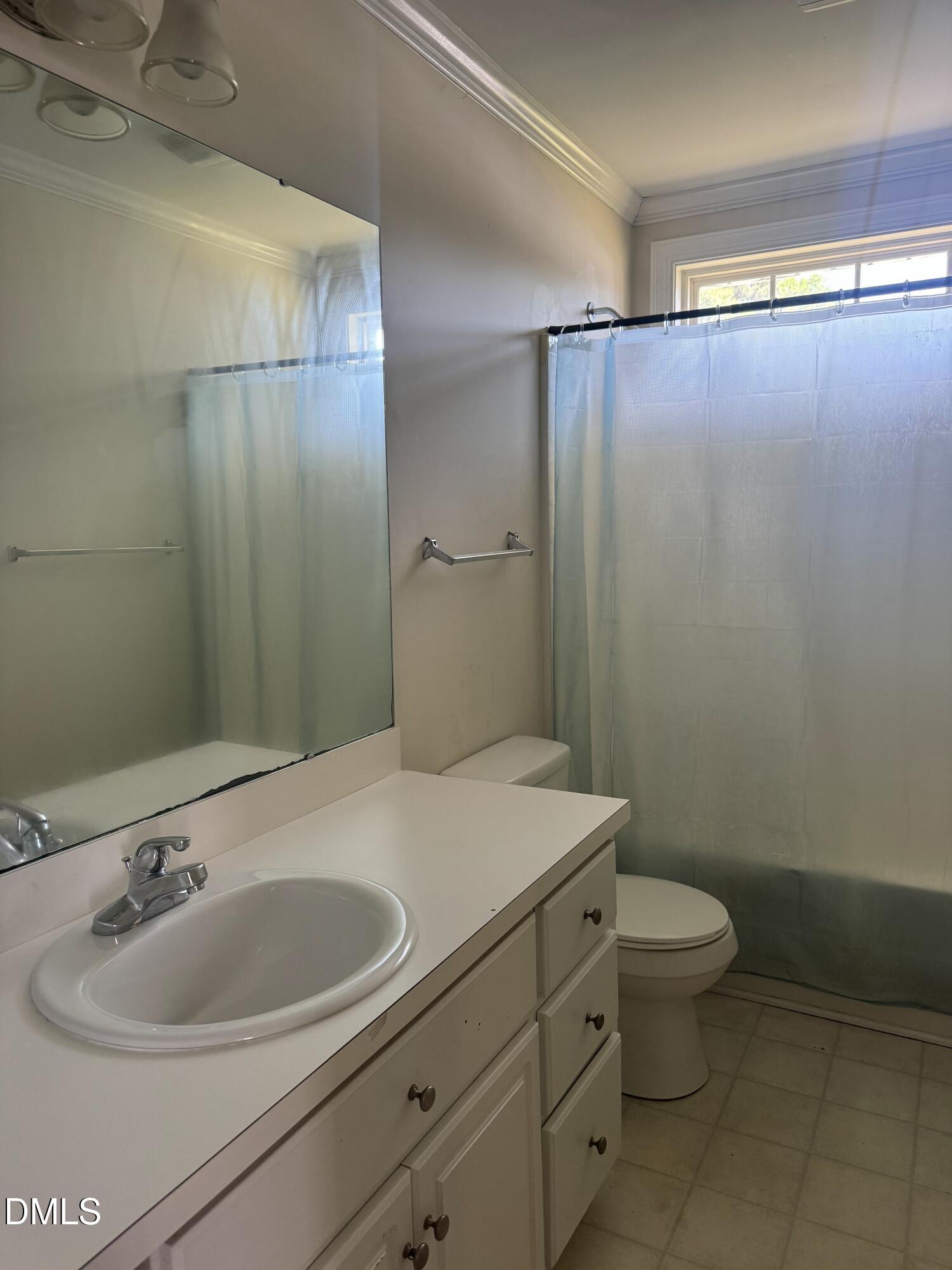 4109 Huntsmoor Lane Wilson, NC 27896 - Photo 21 of 26 a bathroom with a sink toilet and shower