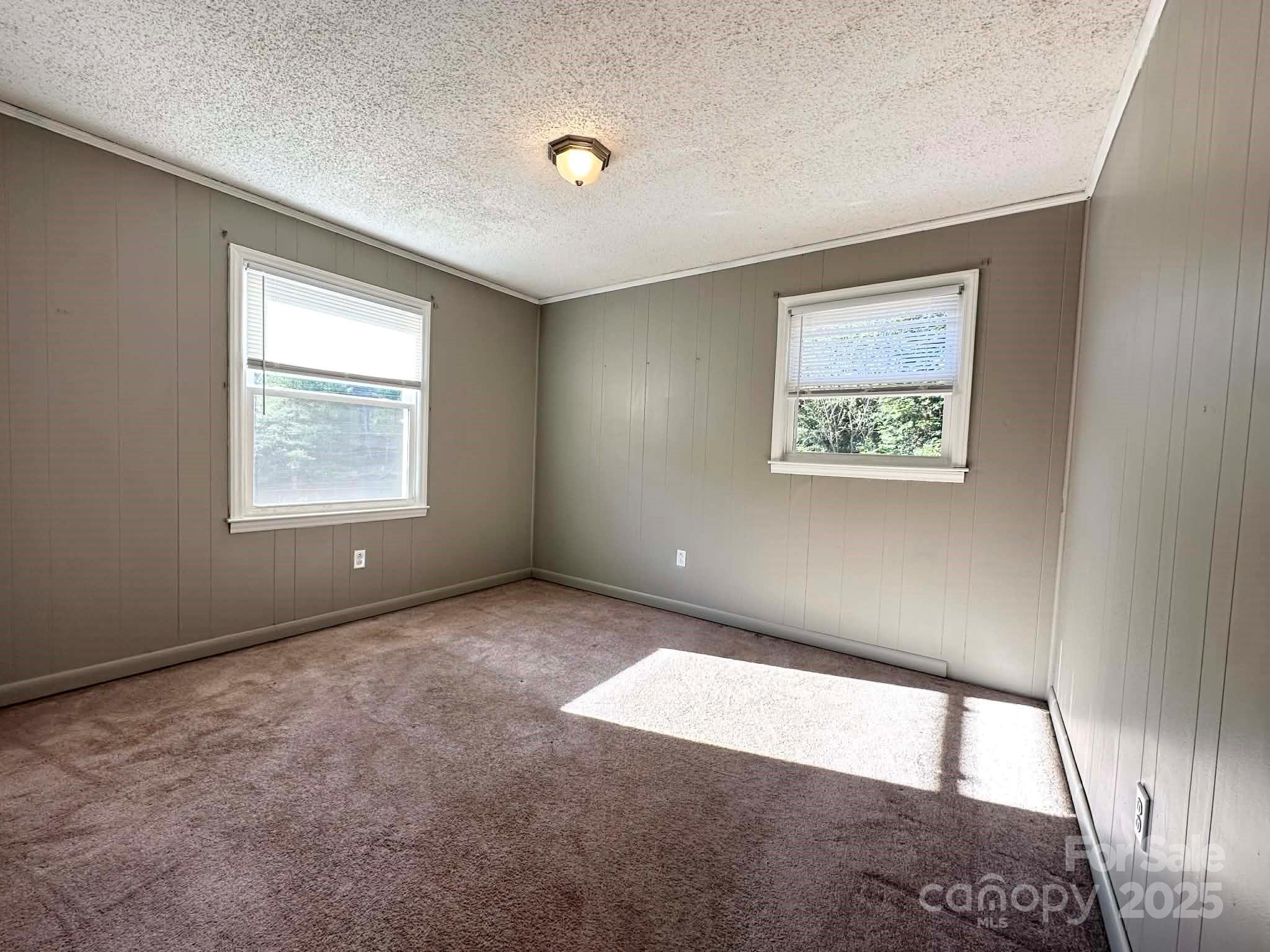 2238 Flatwood Road Lenoir, NC 28645 - Photo 12 of 12 a view of an empty room with a window