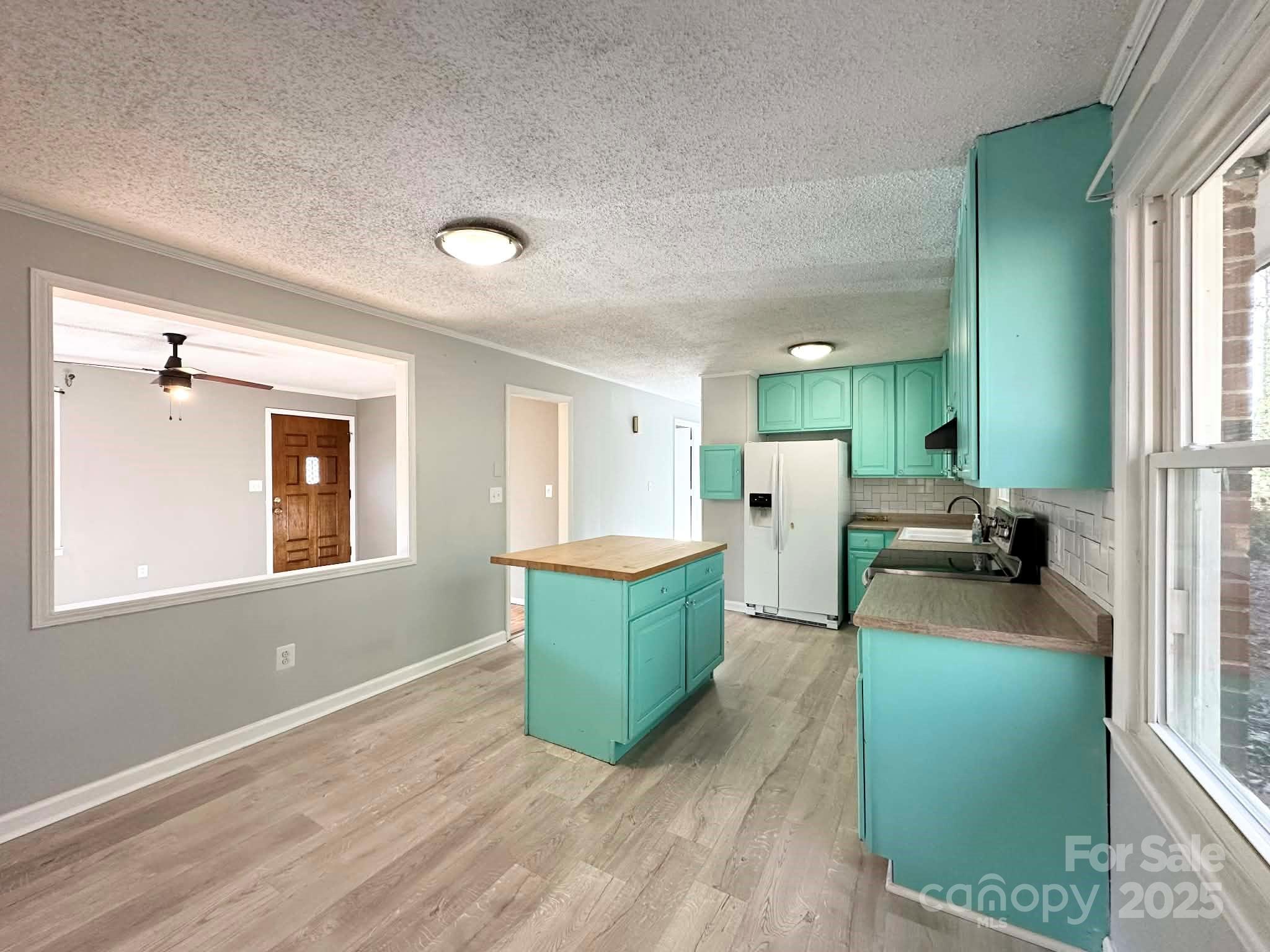 2238 Flatwood Road Lenoir, NC 28645 - Photo 7 of 12 a large bathroom with a sink mirror and a bath tub
