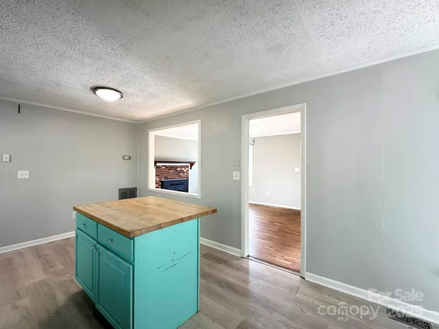 a room that has a sink and a window in it