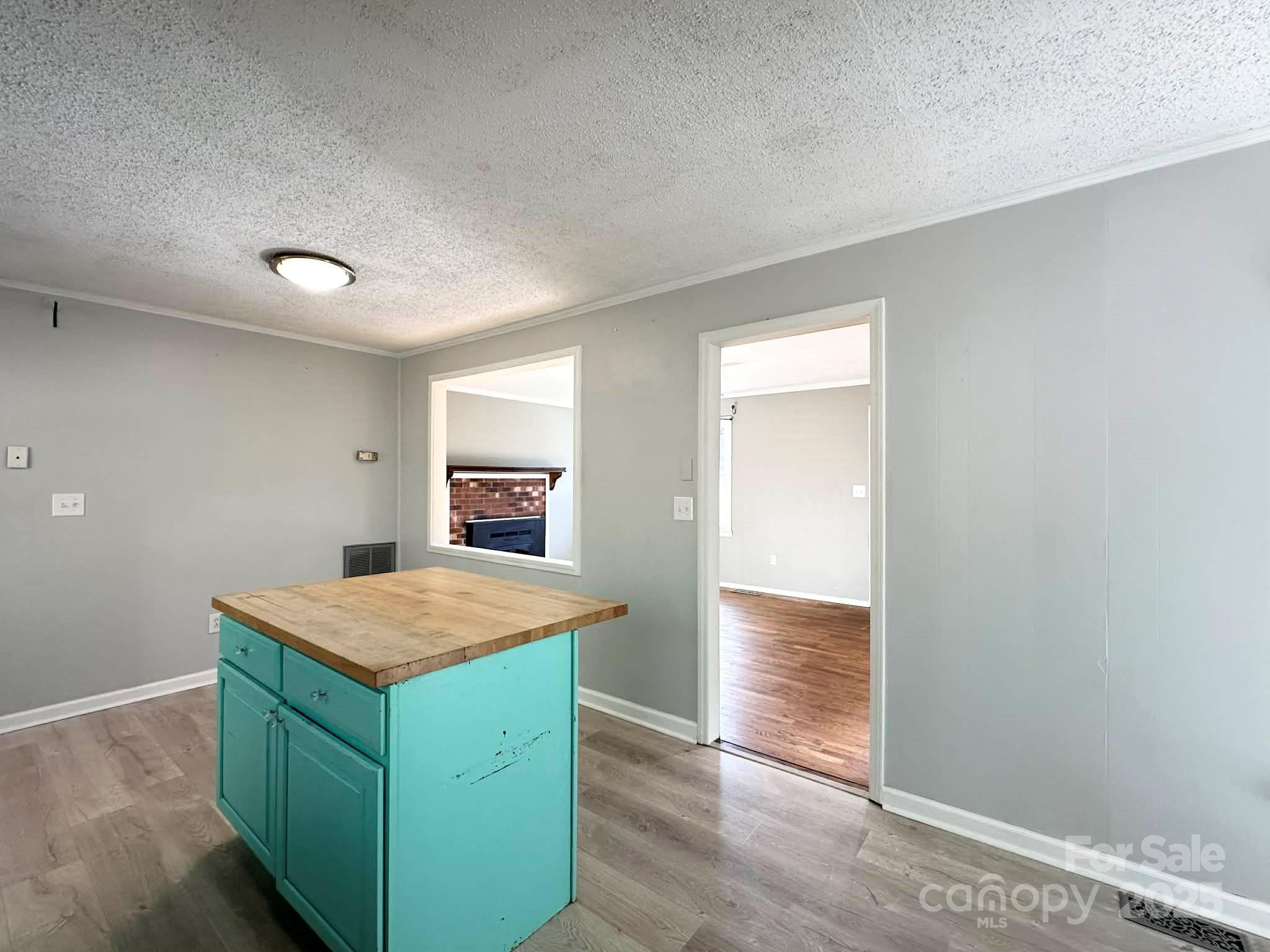 2238 Flatwood Road Lenoir, NC 28645 - Photo 8 of 12 a room that has a sink and a window in it