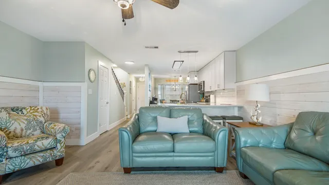 a living room with furniture and a couch