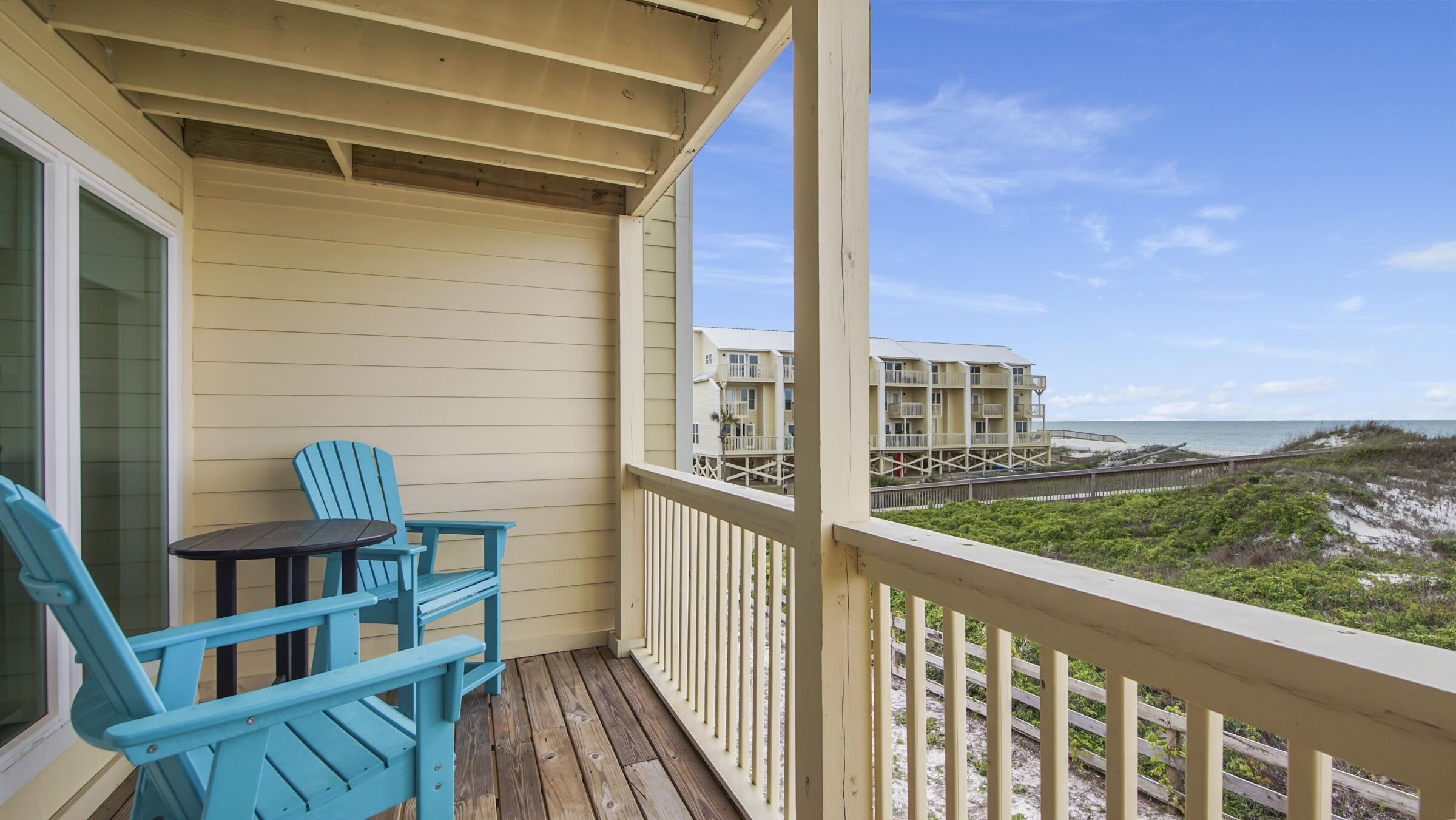 654 Seacliff Drive, Unit 4 Port St. Joe, FL 32456 - Photo 15 of 51 a view of a balcony with furniture
