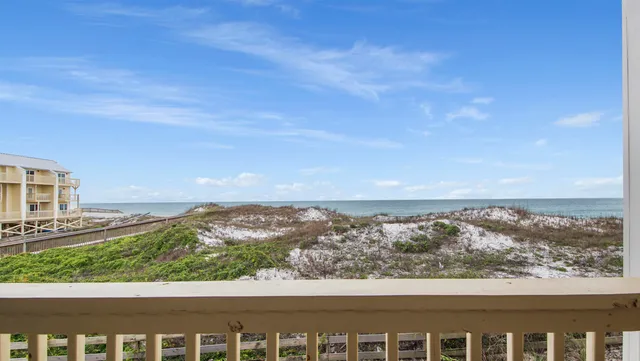 a view of city with ocean