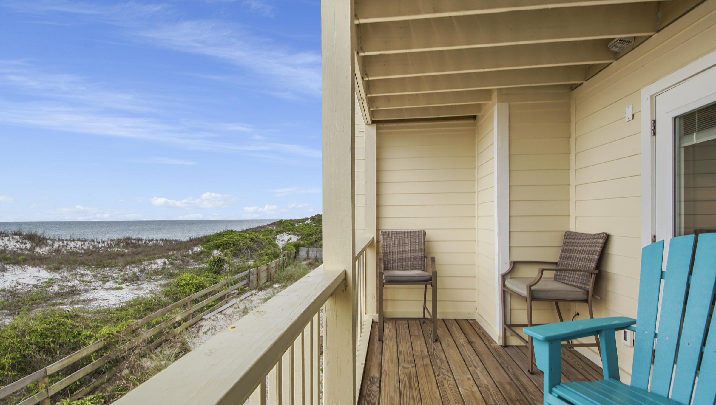 654 Seacliff Drive, Unit 4 Port St. Joe, FL 32456 - Photo 22 of 51 a view of balcony with two chairs and a table
