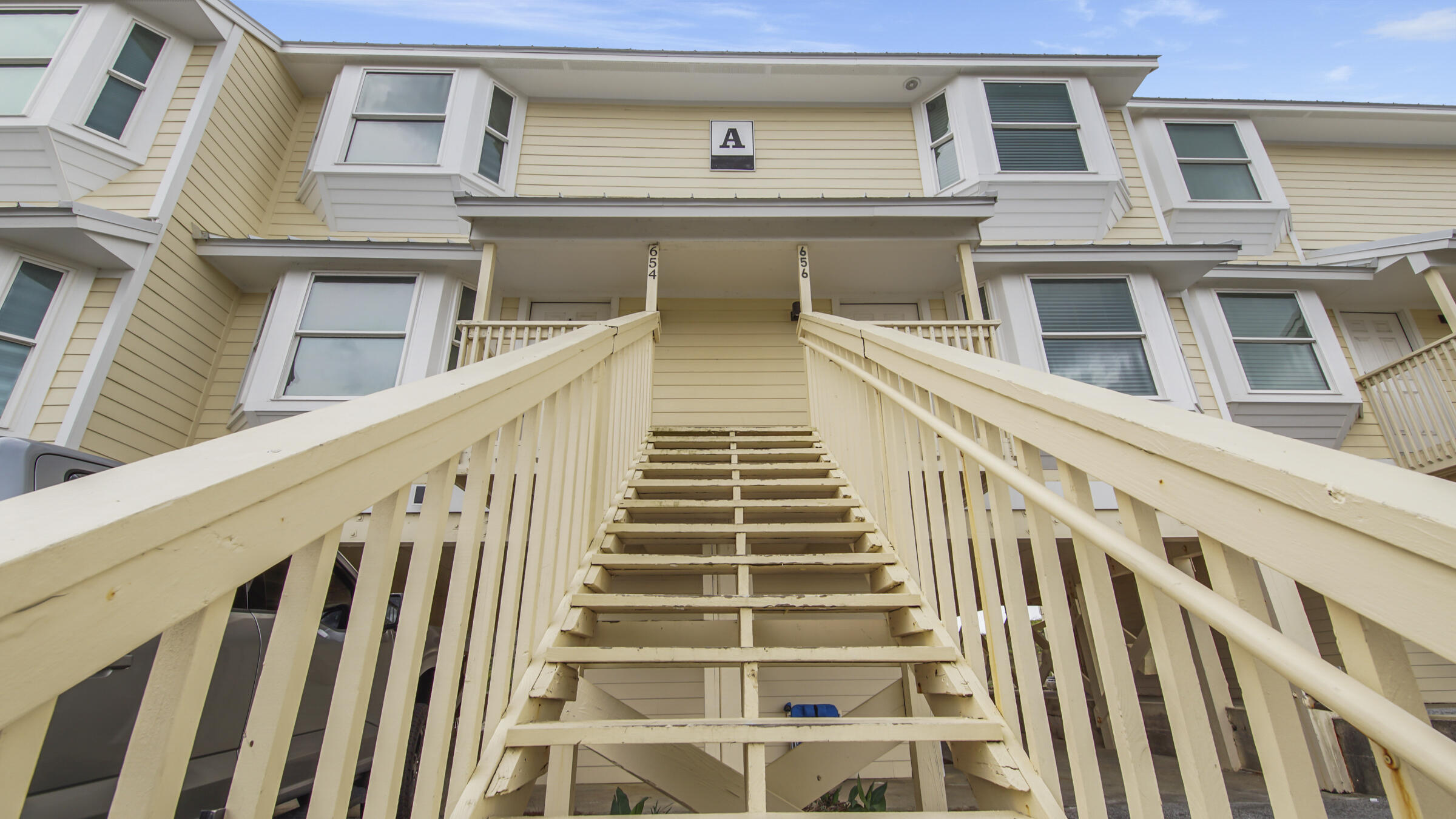 654 Seacliff Drive, Unit 4 Port St. Joe, FL 32456 - Photo 4 of 51 a view of a building with a balcony