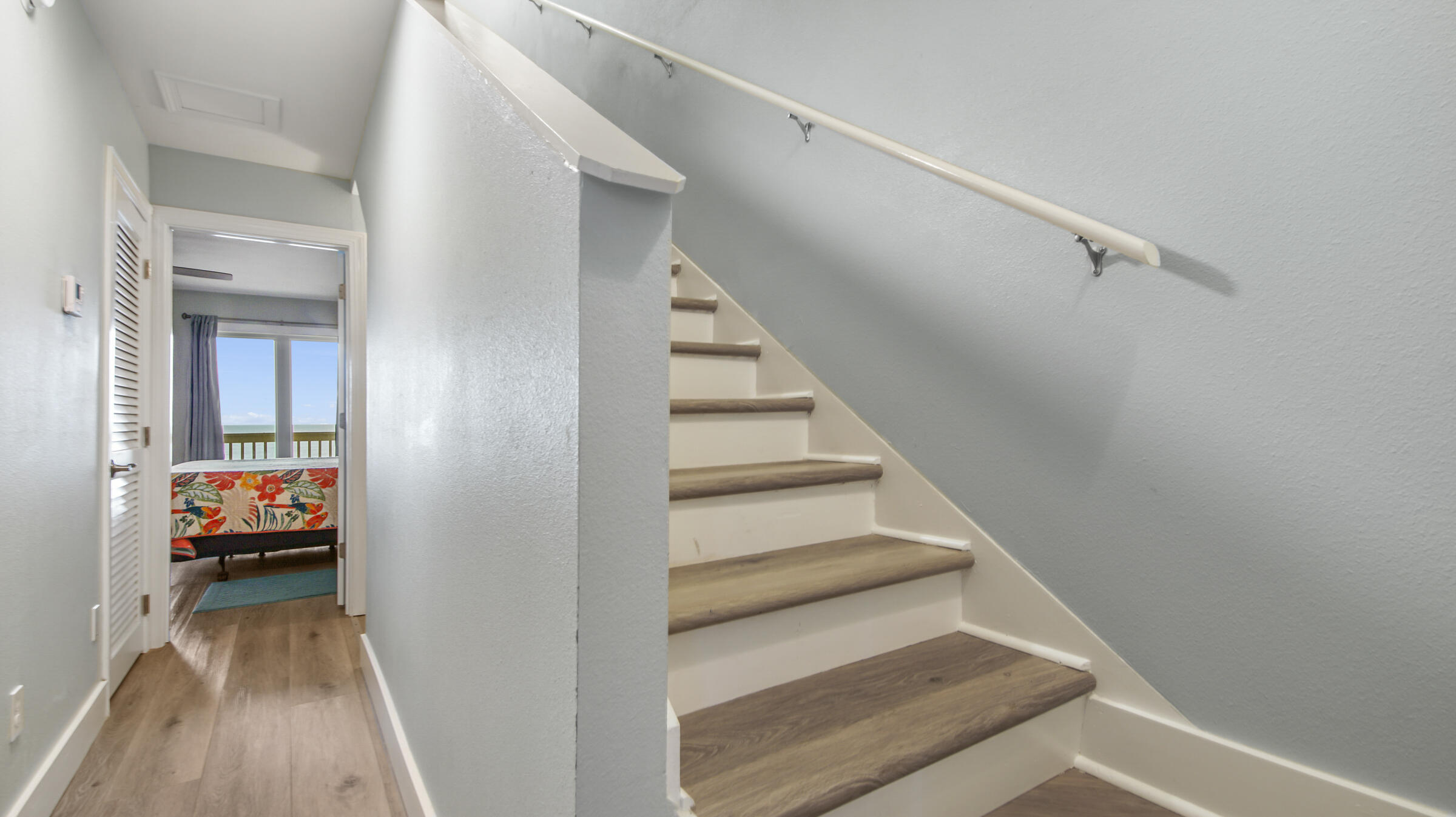 654 Seacliff Drive, Unit 4 Port St. Joe, FL 32456 - Photo 42 of 51 a view of entryway and hall with wooden floor