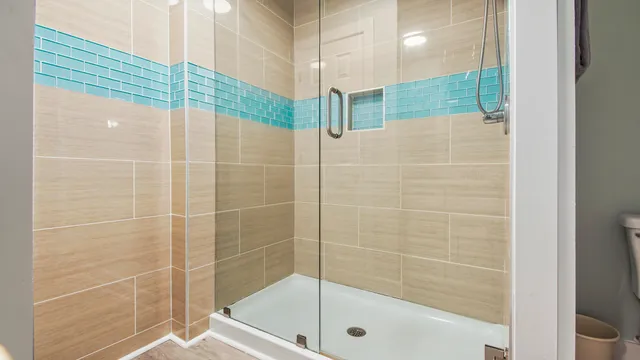 a view of balcony with wooden floor and fence