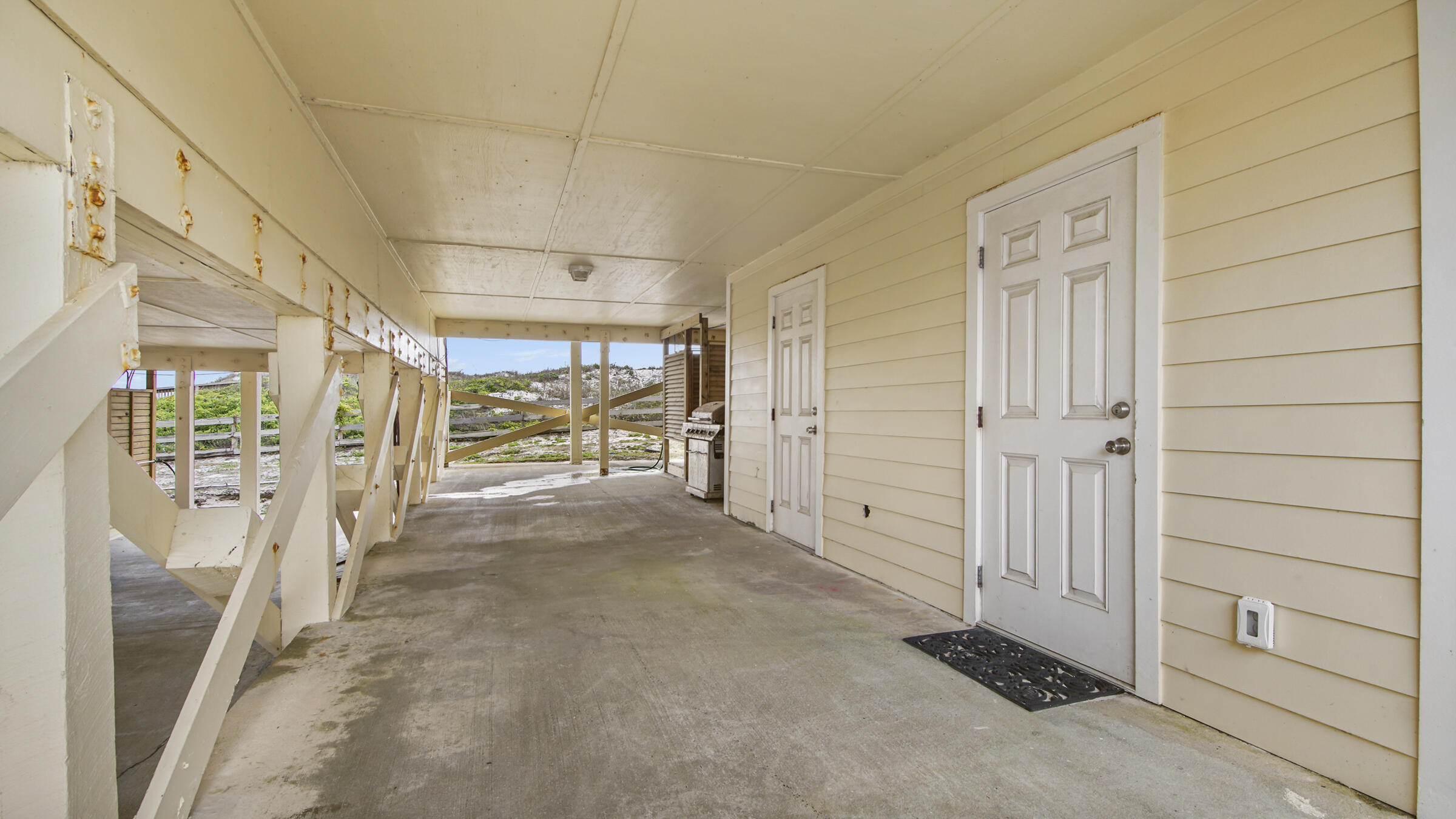 654 Seacliff Drive, Unit 4 Port St. Joe, FL 32456 - Photo 50 of 51 a view of a hallway with closet area