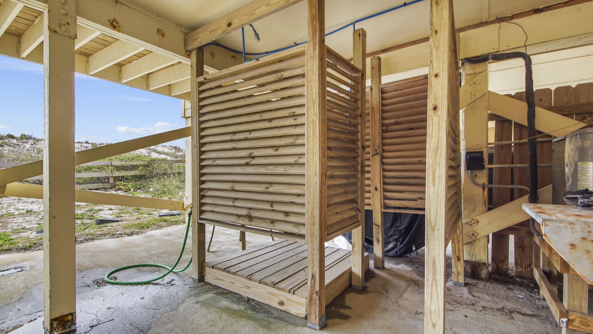 654 Seacliff Drive, Unit 4 Port St. Joe, FL 32456 - Photo 51 of 51 a view of a balcony with floor to ceiling windows with wooden floor