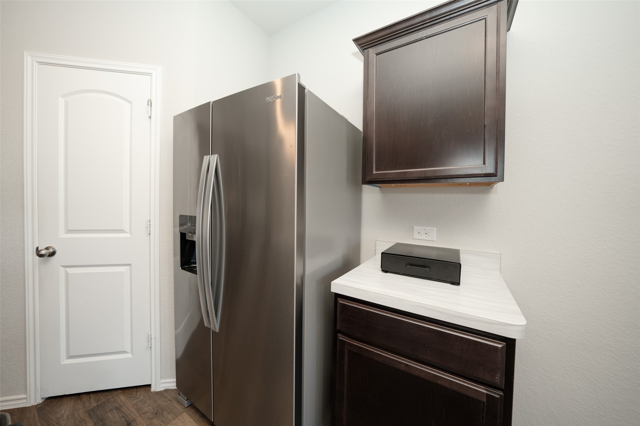 20818 Edmeston Way Katy, TX 77449 - Photo 14 of 32 a kitchen with a refrigerator and a microwave